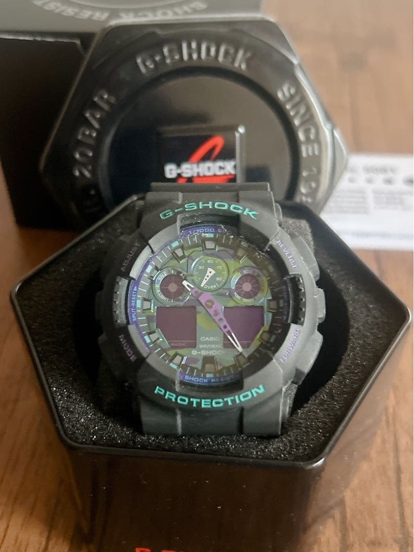G SHOCK GA 100 1A purple camouflage