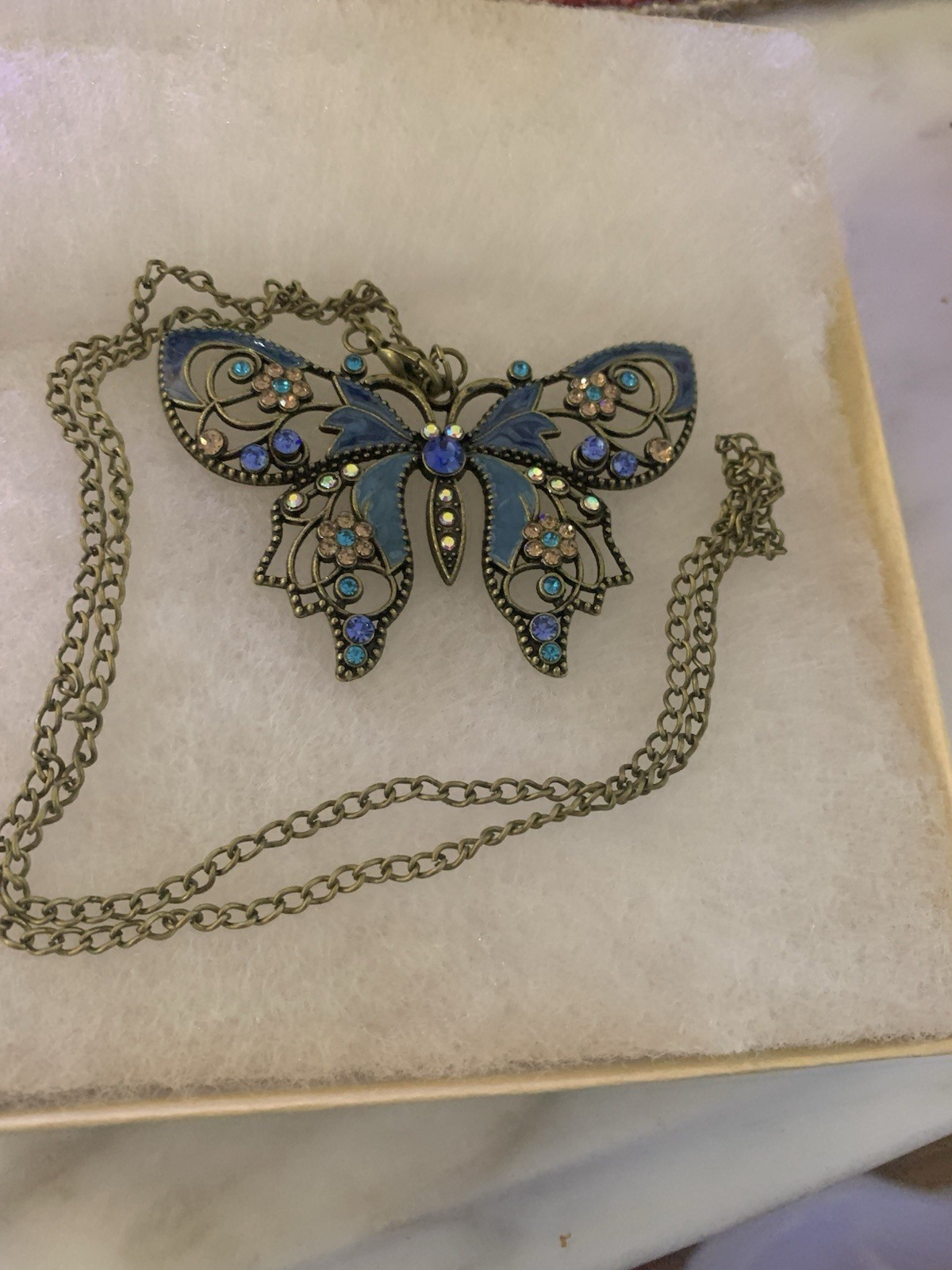 Blue Butterfly Necklace with Many Colorful Stones and An Antique Goldlike Chain