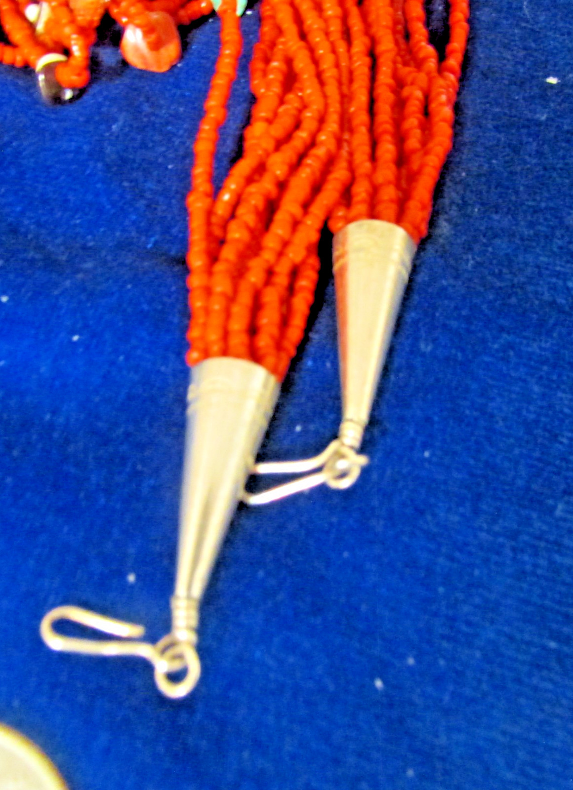 VINTAGE SOUTHWEST N.A, 10 STRAND CORAL NECKLACE, WITH ASSORTED FETISHES