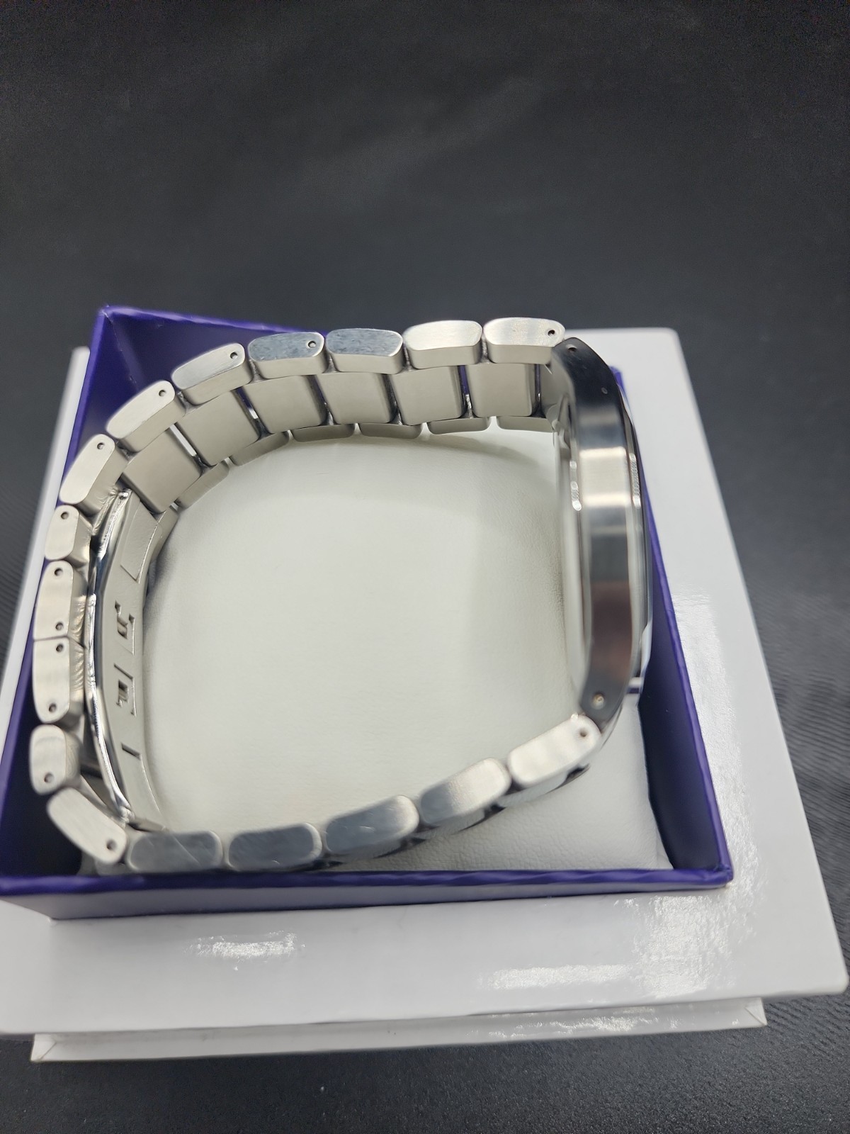 Movado Stainless Steel Defio Men’s Blue Museum Dial Dress Watch new battery