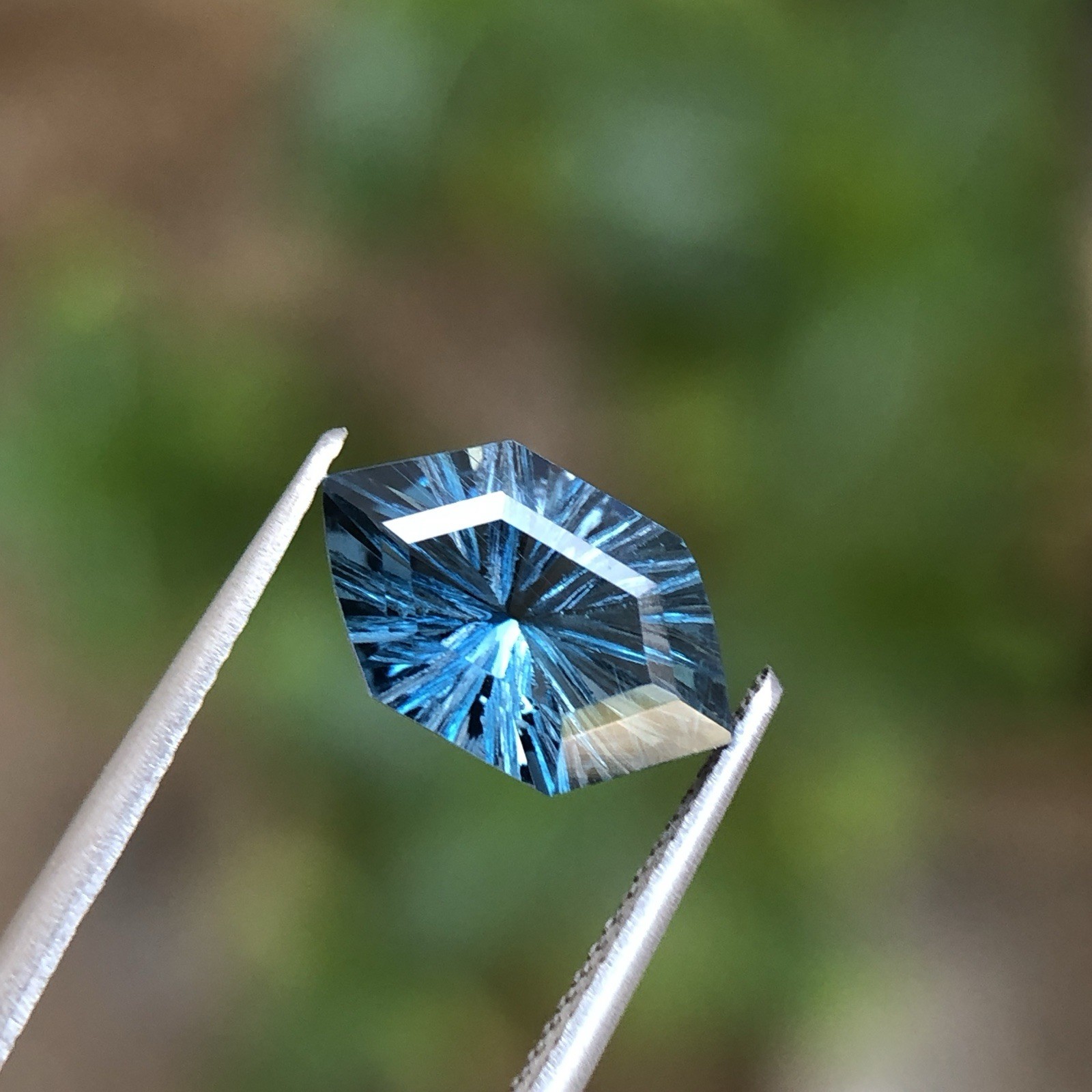Natural London Blue Topaz Fantasy Cut Long Hexagon 12.5 MM 3.90 Carat.
