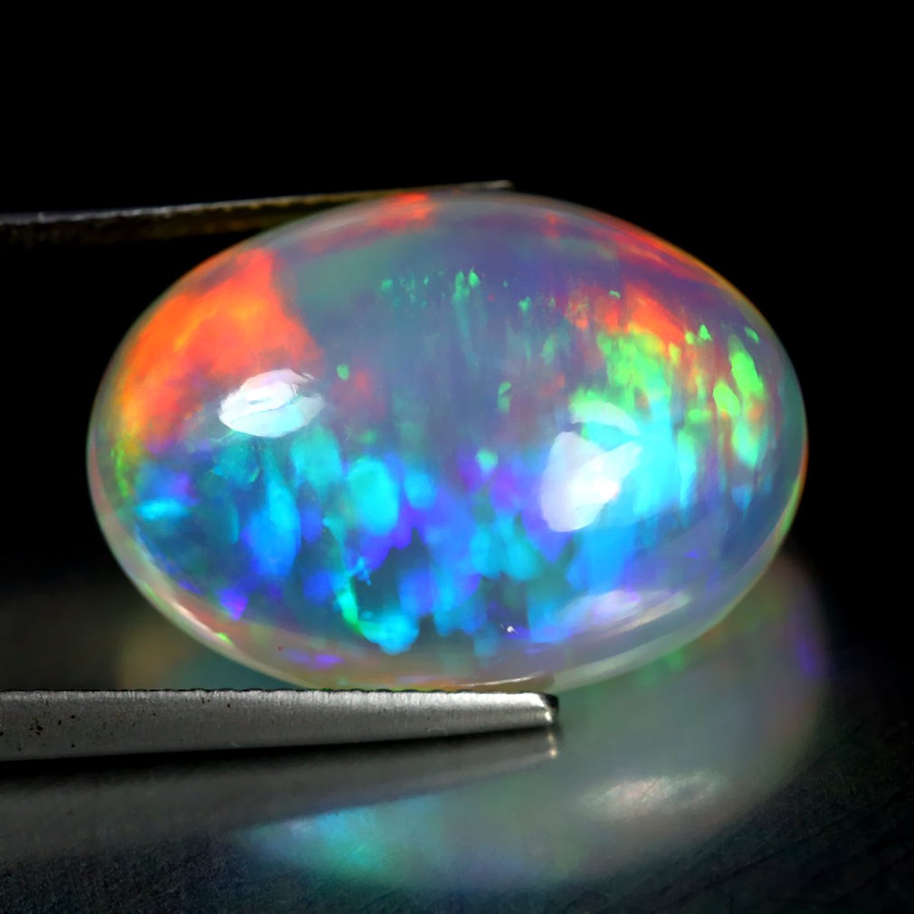 19.27 ct Oval Cabochon (22.01 x 15.84 mm) Natural Play of Colors Rainbow Opal