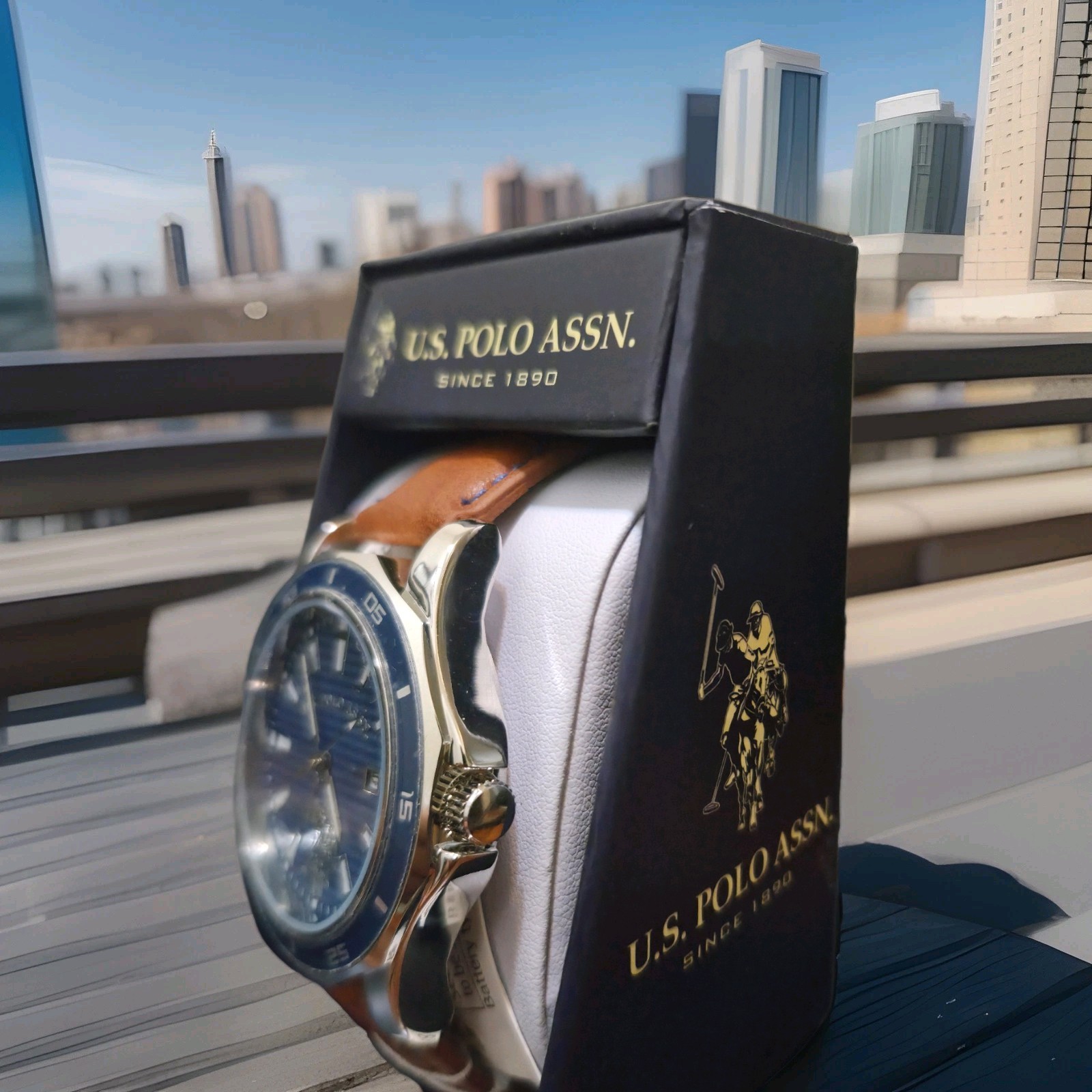 U.S. Polo Assn. Men’s Quartz Date Blue Dial Blue Bezel Brown Leather Strap Box