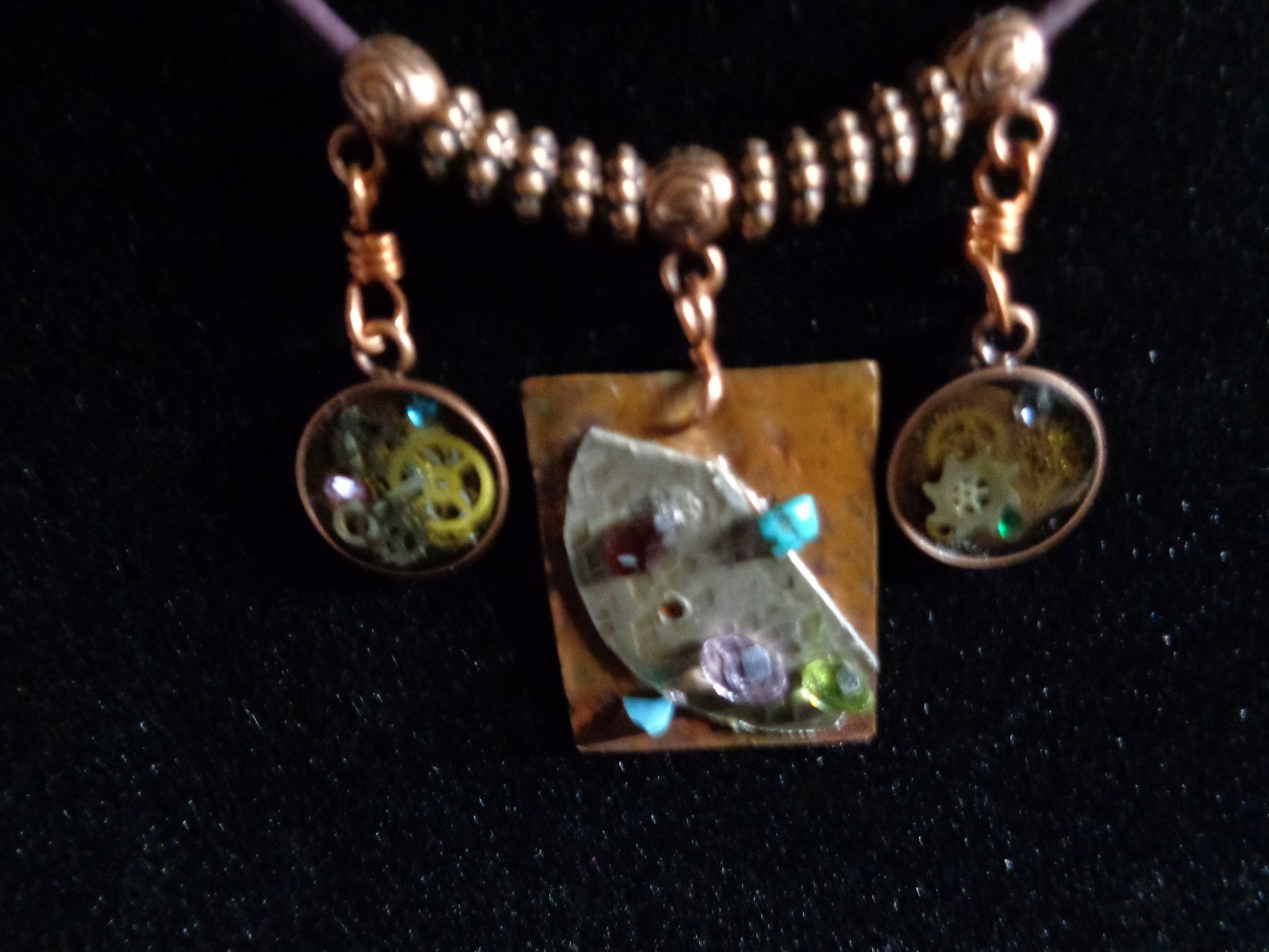 Artisan crafted,eclectic,18” necklace. Central handcrafted copper collage pendan