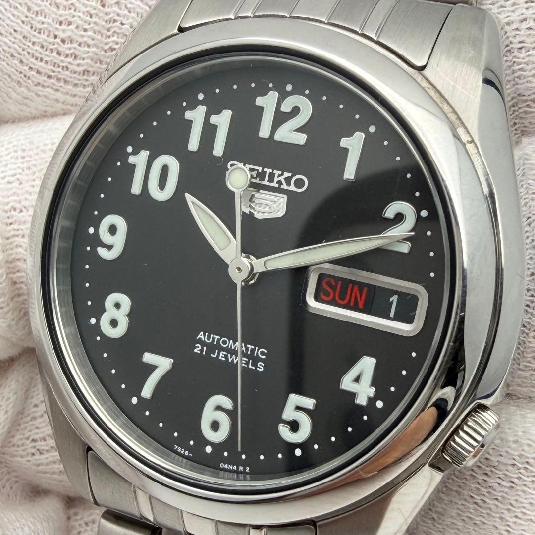 SEIKO 5 7S26-01V0 Automatic, 21 jewels, open case back, black dial