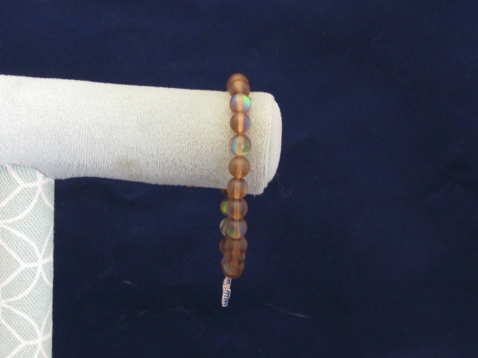 Alexa’s Angels Stretch Bracelet with Color Catching Beads & a Cross Charm