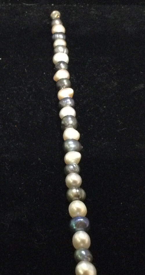 Peach and blue/gray freshwater pearl bracelet.