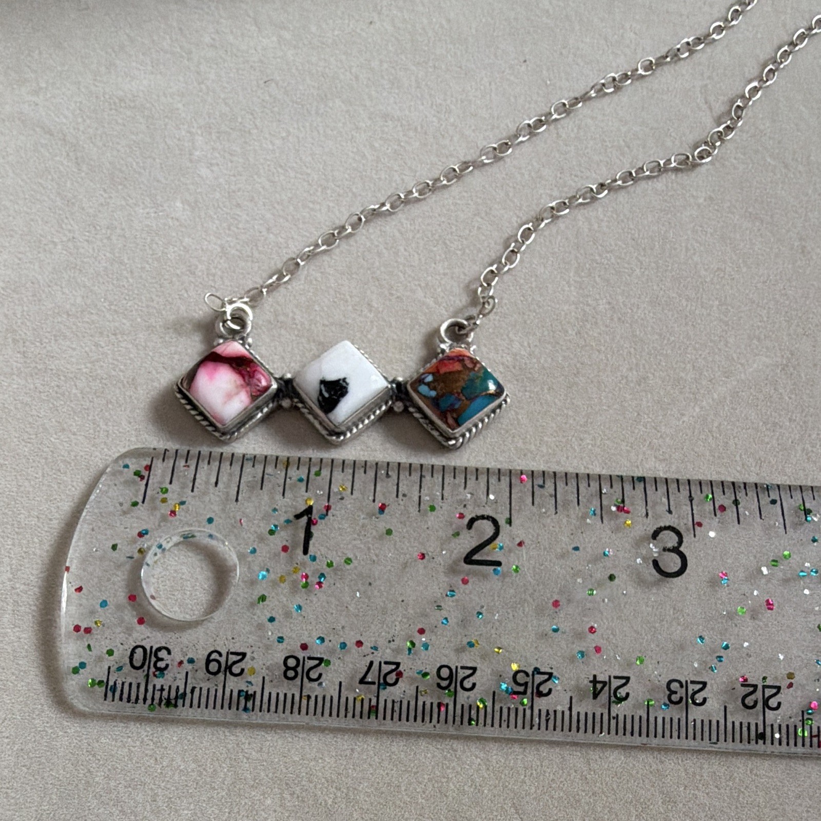 Sterling 925 three stone necklace. pink dahlia, white buffalo, orange spiny. 18”