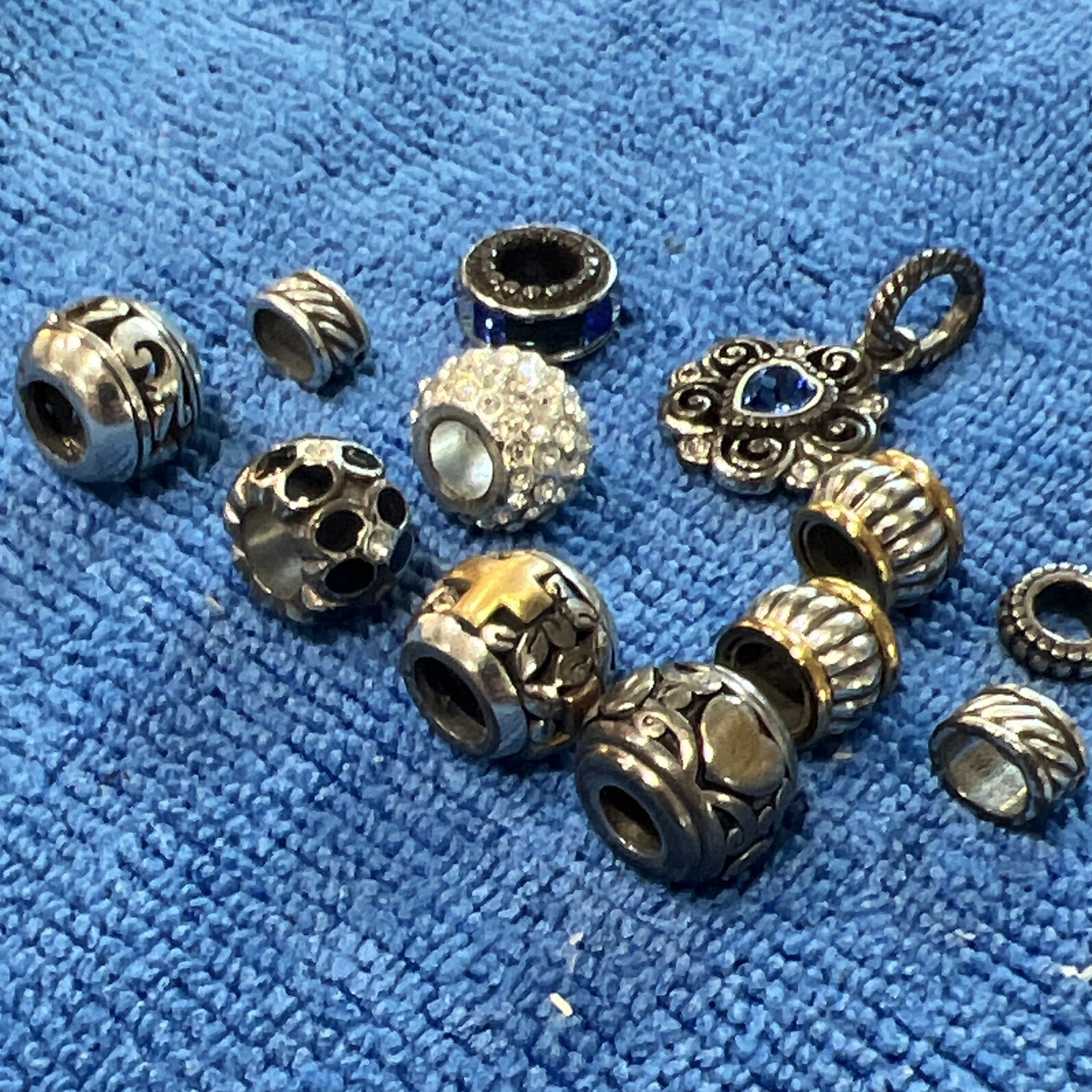 Brighton Charms 12 pieces. Excellent condition 1 mm beads