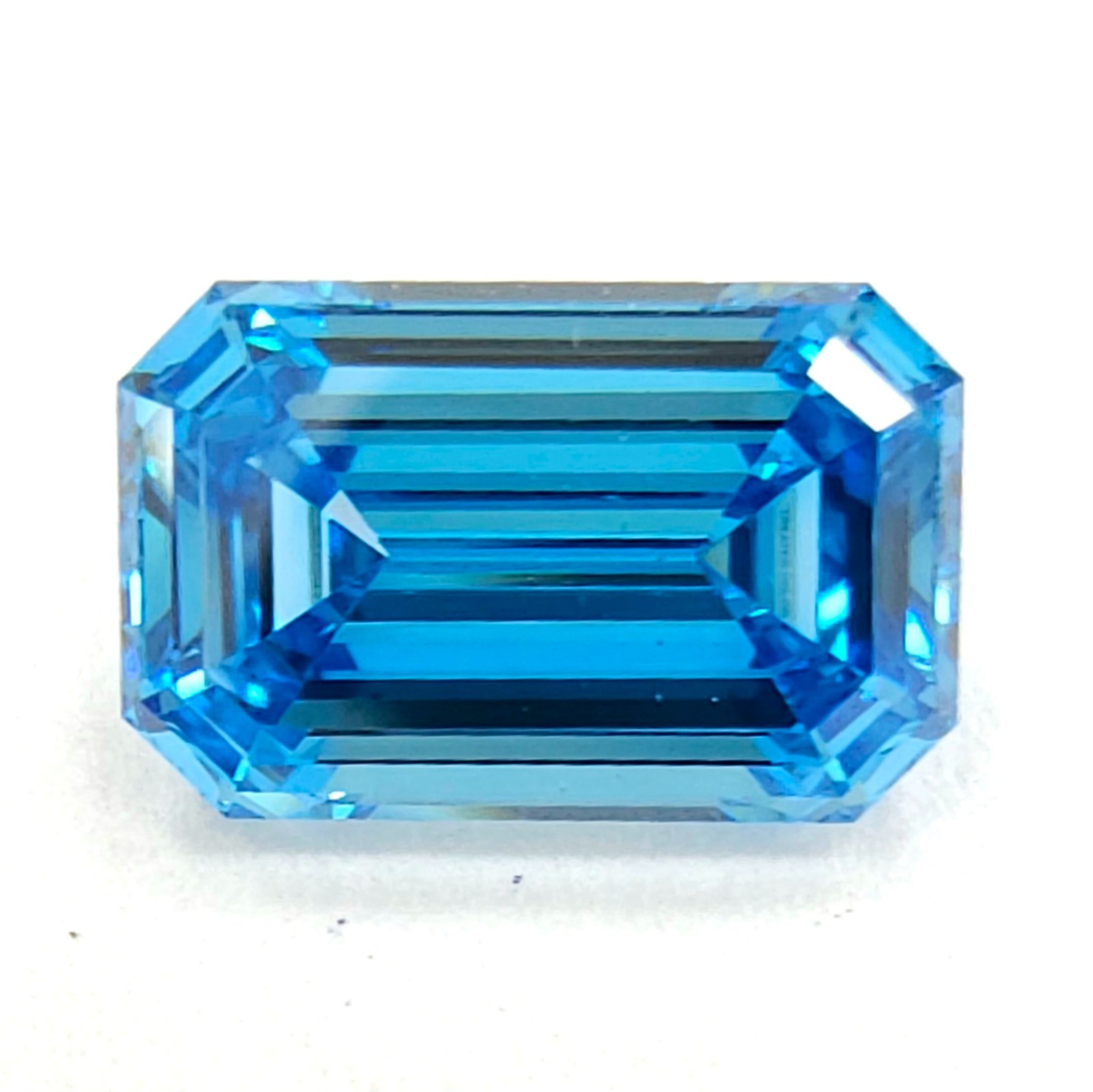 0.78 Carat Fancy VIvid Blue Diamond GIA Certified VS1 Emerald Cut