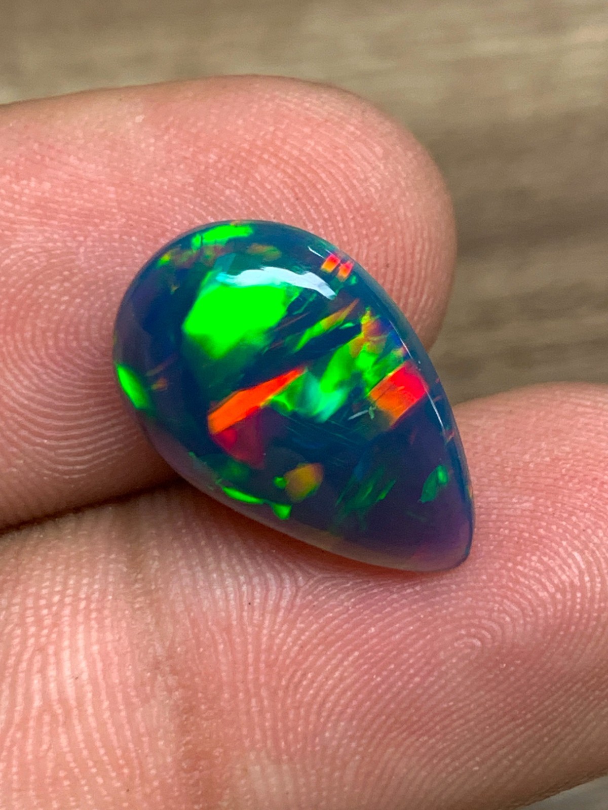 Ethiopian Opal Gemstone 4.65crt Pear Cabochon Black Welo Rainbow Flash Gemstone