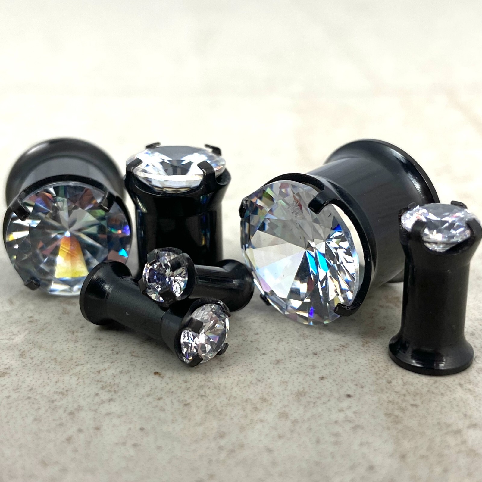 Pair 316L Black Steel Double Flare Plugs with Prong Set Clear CZ (PS-151) gauges
