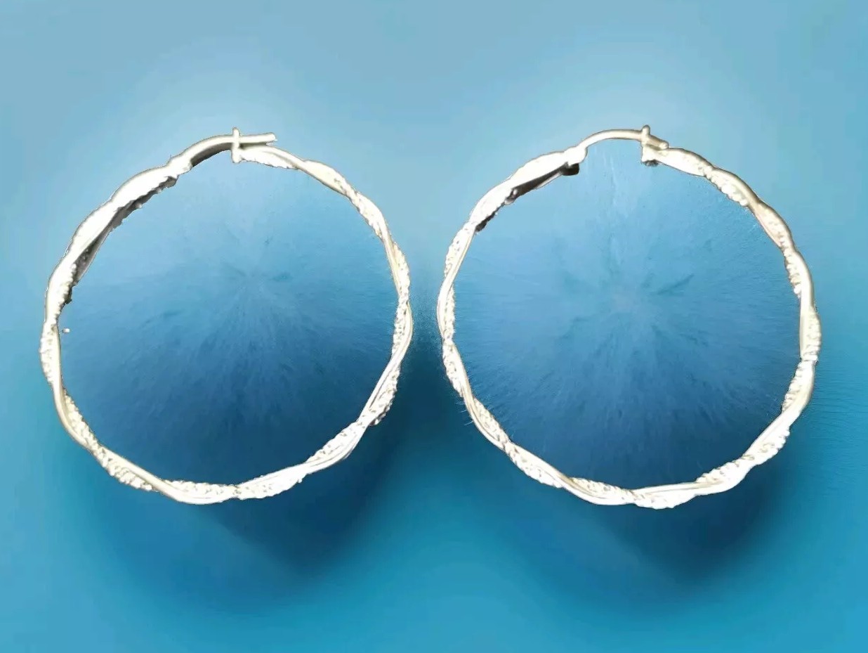 Erick’s Sterling Silver Braided 2 1/8 in. wide Hoop Earrings Taxco.925