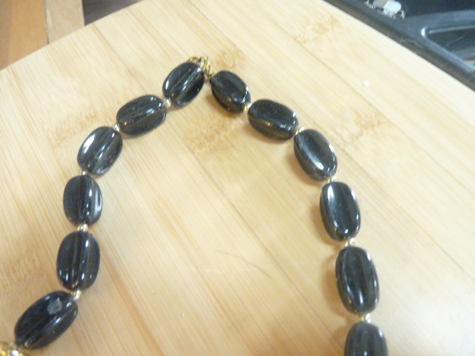 Black and Gold Wrapped Candy Necklace 22.5 inches long