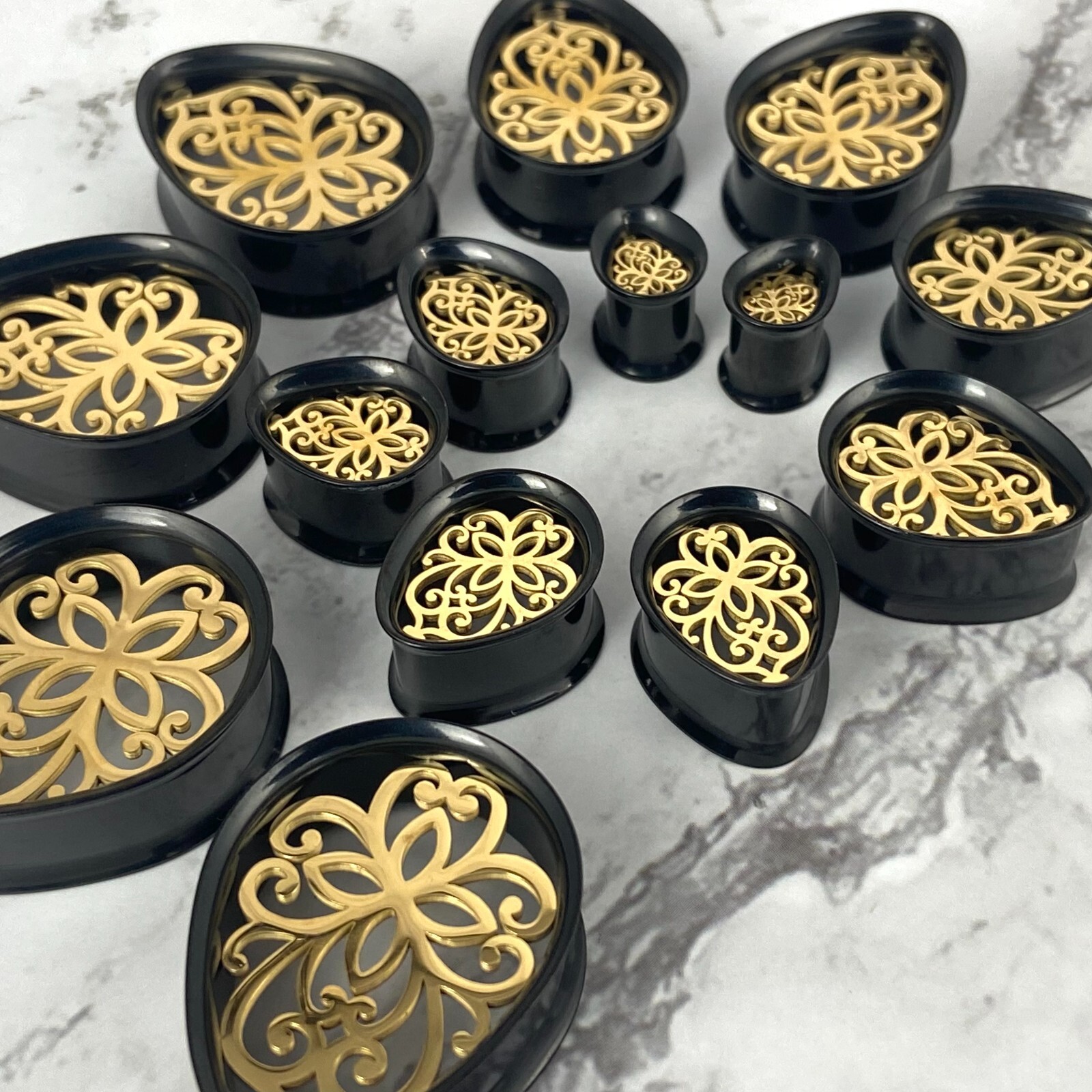 Pair Black Steel Teardrop Tunnels Gold Steel Inlay (PS-283) gauges plugs