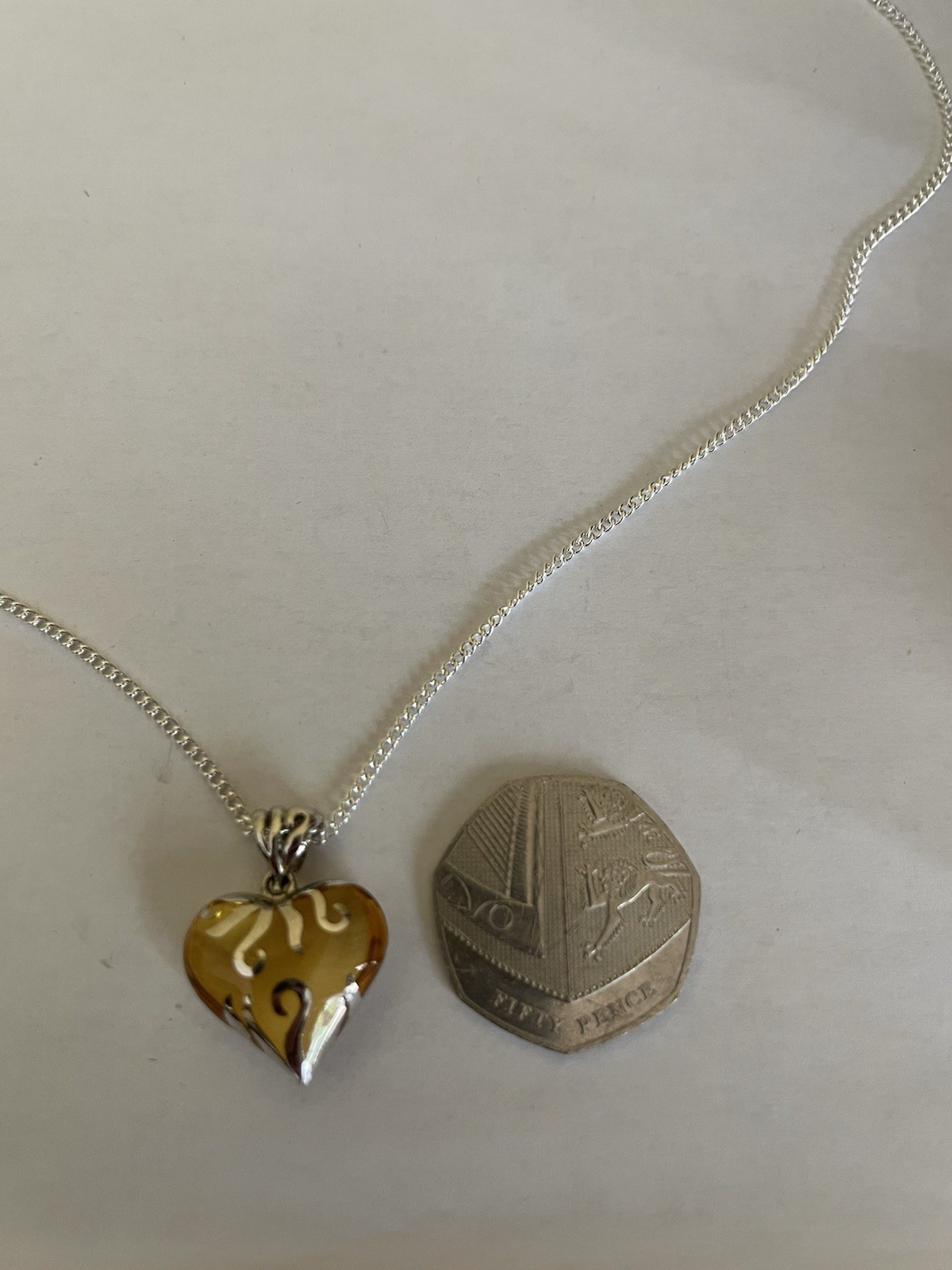 Sterling Silver Amber Heart Pendant On 46cm Length Chain