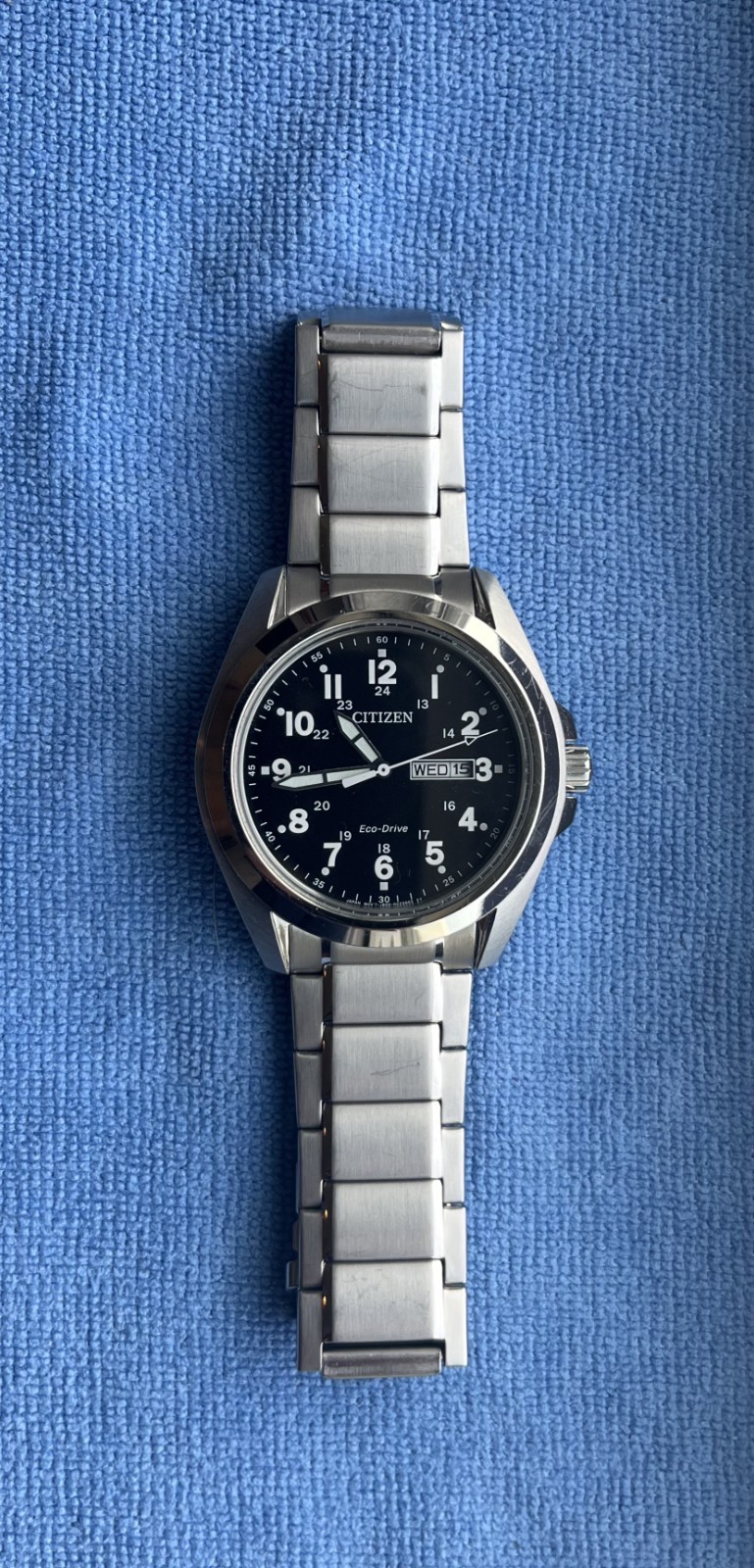 Citizen Eco-Drive Garrison Men’s Black Dial Stainless Steel Watch – AW0050-82E