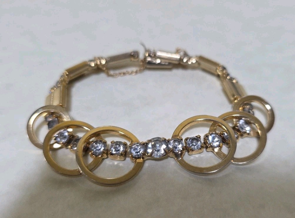 Goldtone Circles with Rhinestone Bracelet With Safety Chain Box Clasp. #781