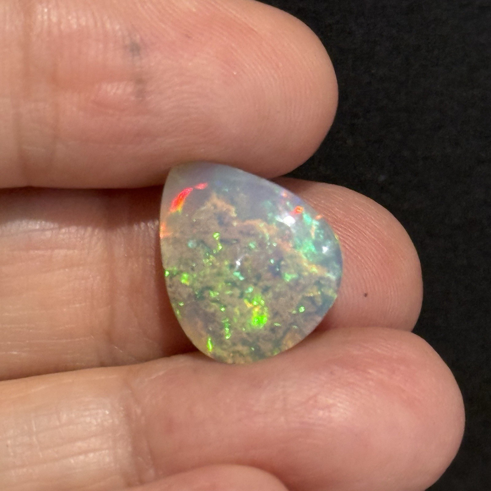 6.85ct 15.2×13.3×6.7mm Fine Galaxy Ethiopian Welo Opal Pear Shaped Cabochon Gem