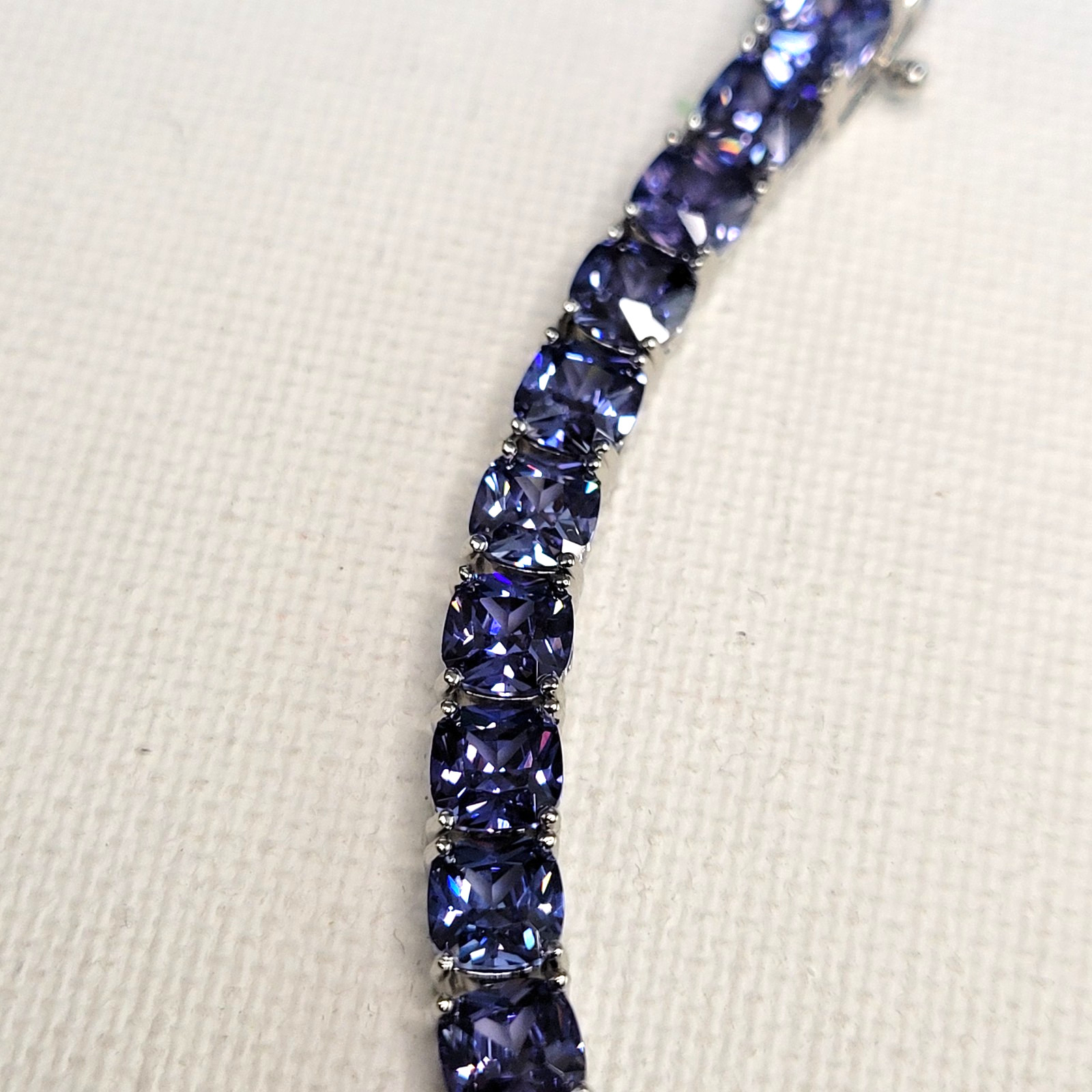 925 Bella Luce Platinum on Sterling Silver Tanzanite CZ Tennis Bracelet 27.5ctw