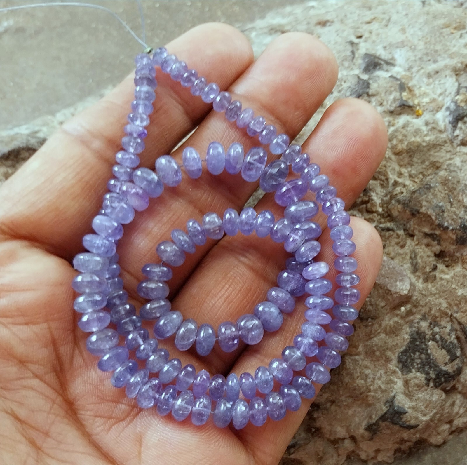 141 Carat 4.5 to 8 MM Natural Light Blue Color Smooth Tanzanite 17 Inch Beads