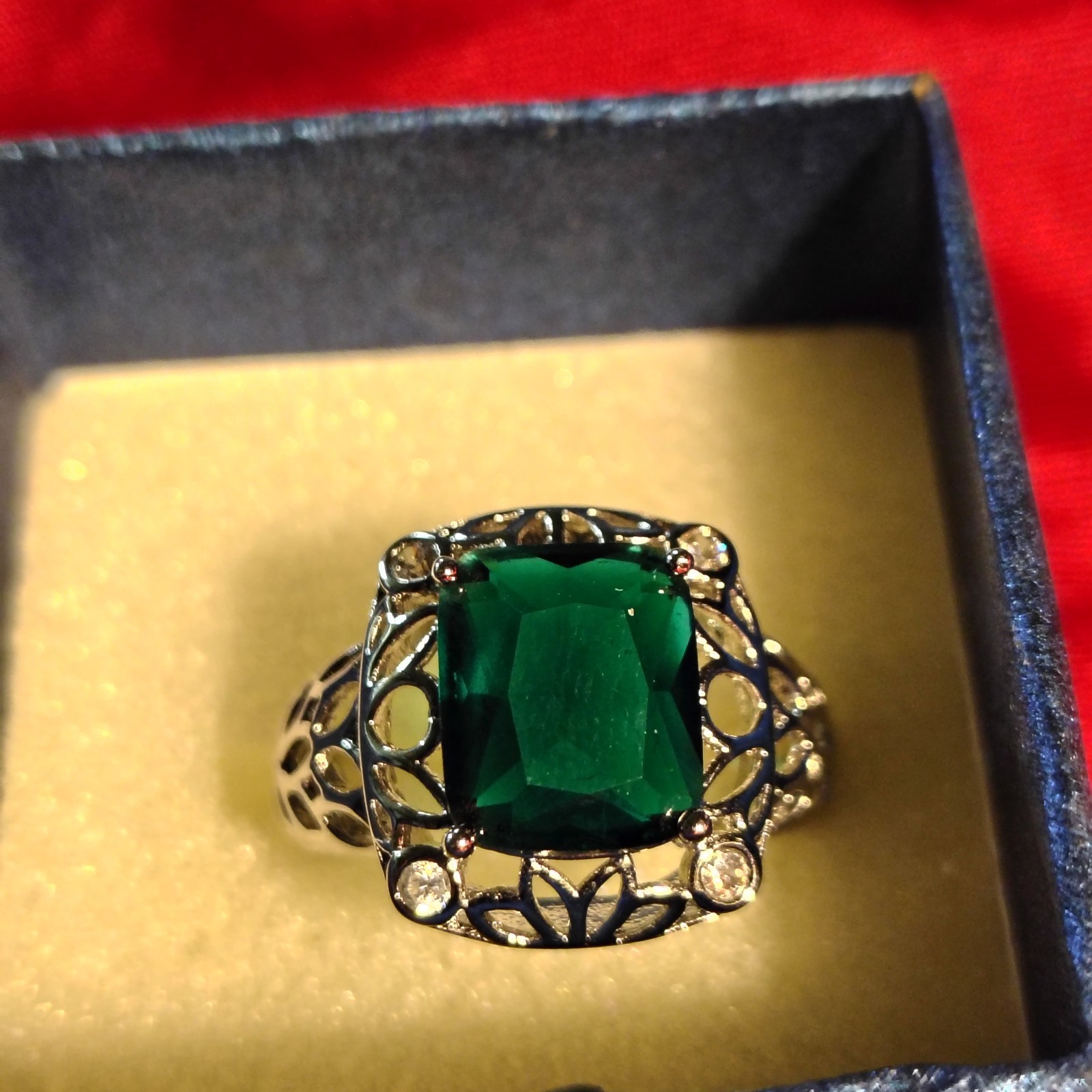 Simulated Emerald Ring With Halo of Small Cubic Zirconia Size 8