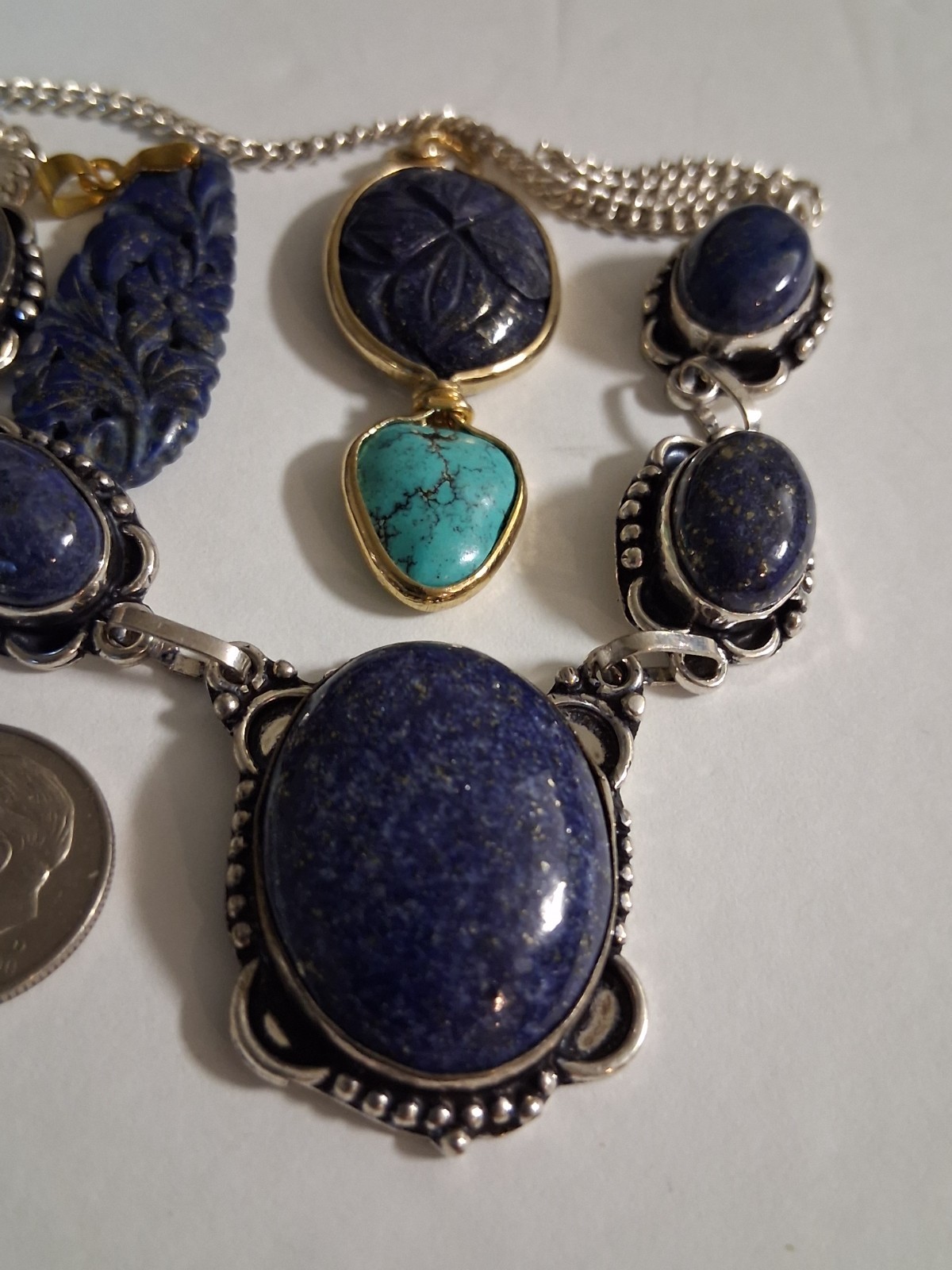 carved lapis lazuli gold filled pendants, sterling silver necklace, total 40g