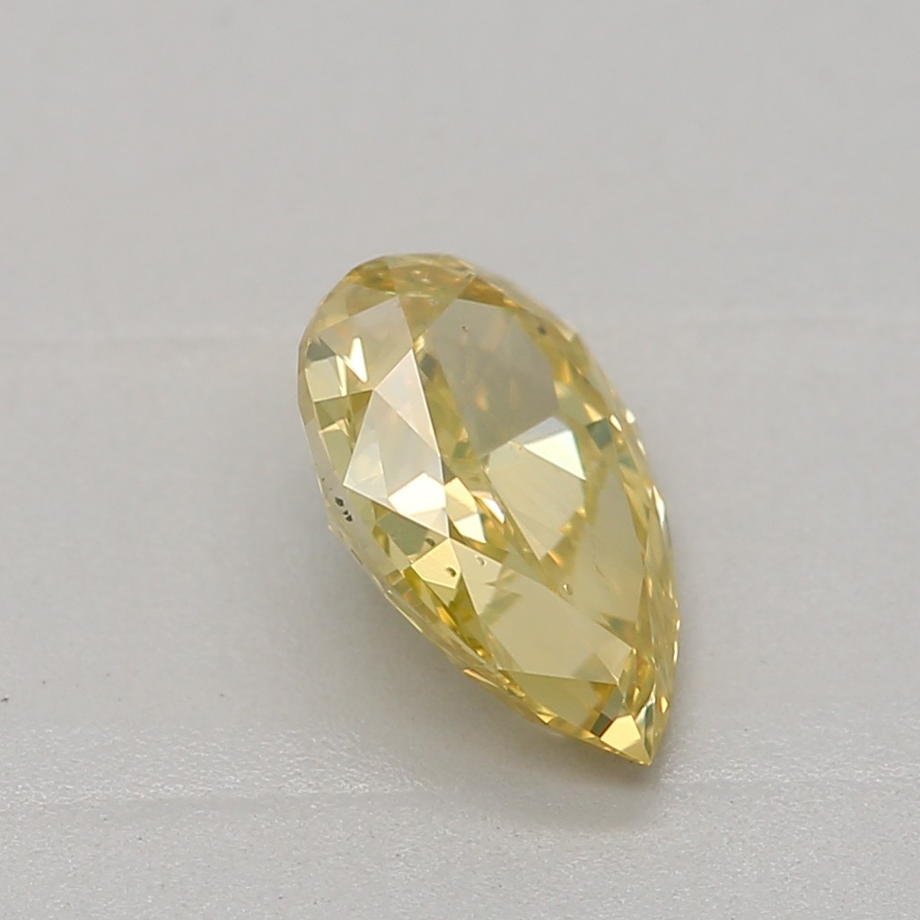 0.60 carat, Fancy Intense Yellow, Pear Shape, SI2 Clarity, GIA