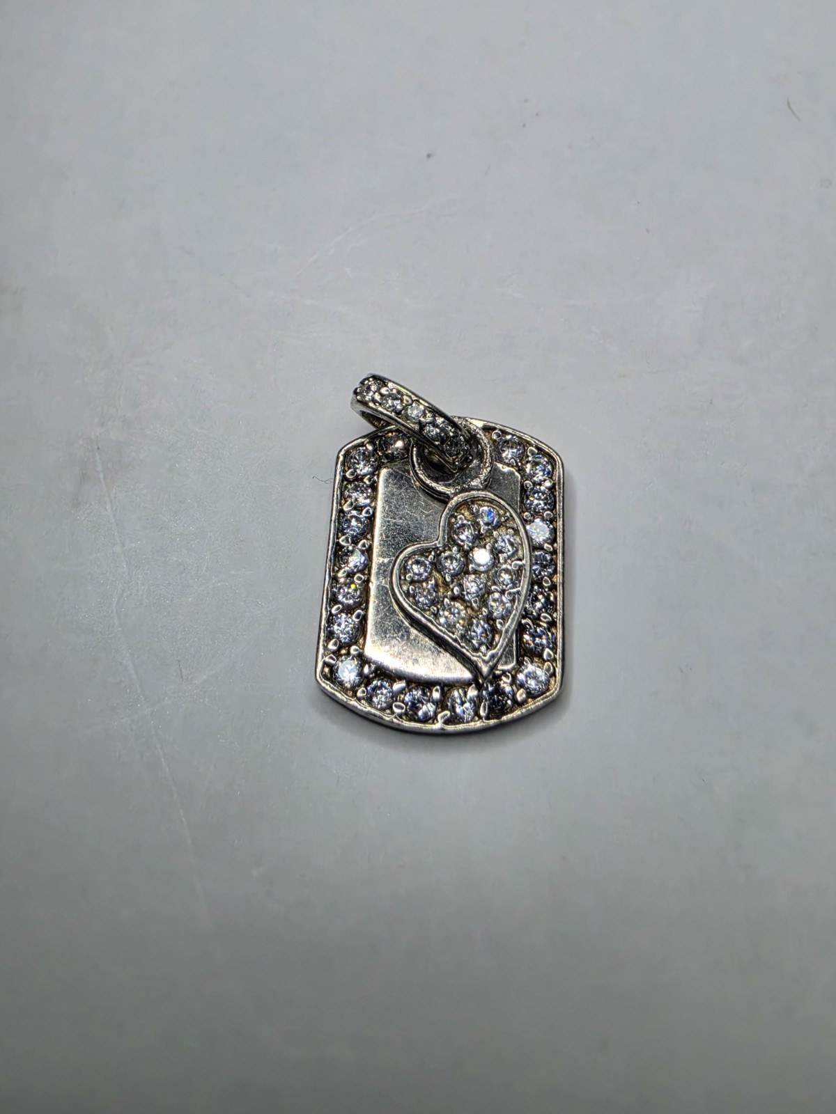 Sterling Silver Clear Crystal Accented Tag with Heart Pendant