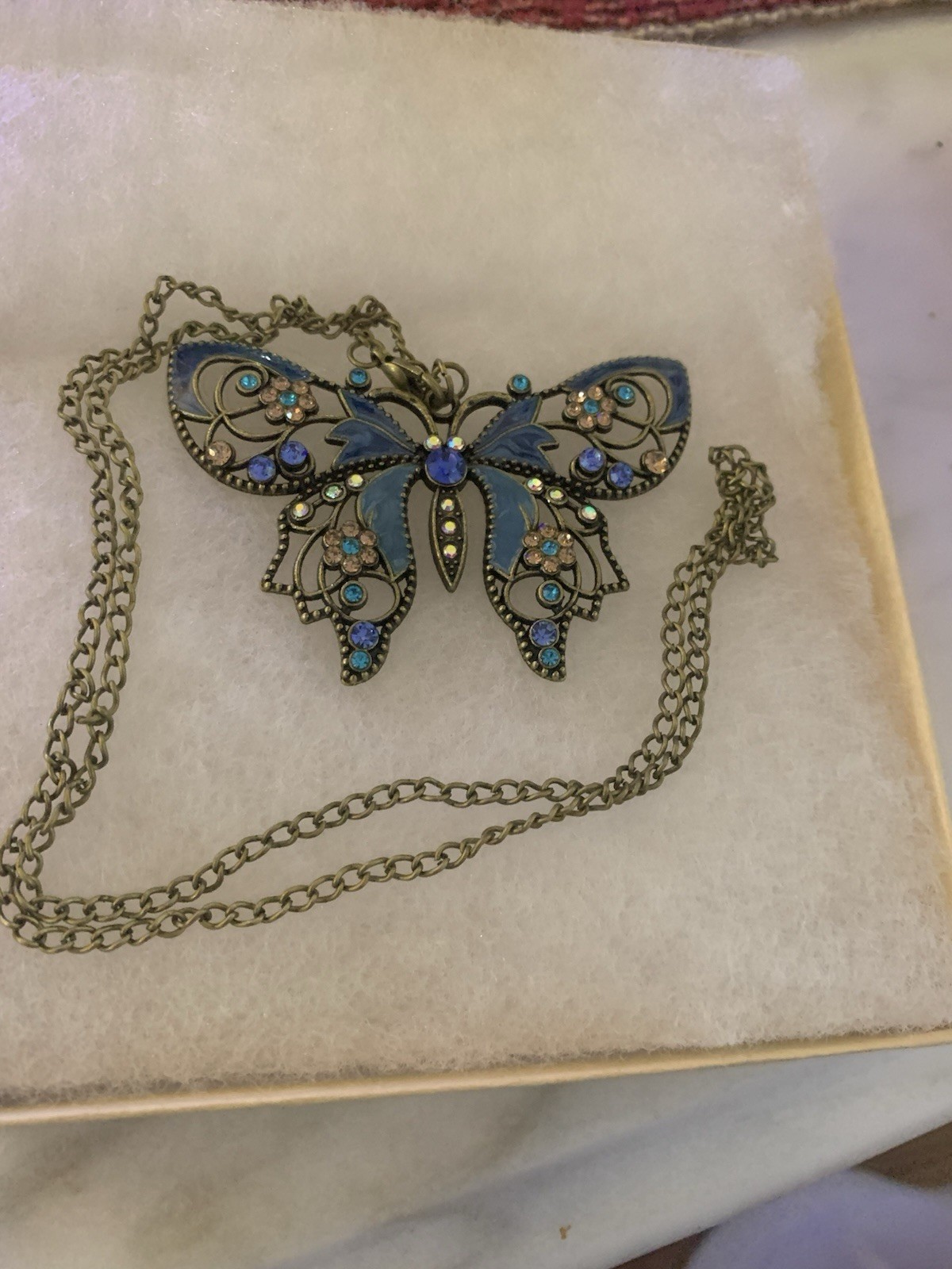Blue Butterfly Necklace with Many Colorful Stones and An Antique Goldlike Chain