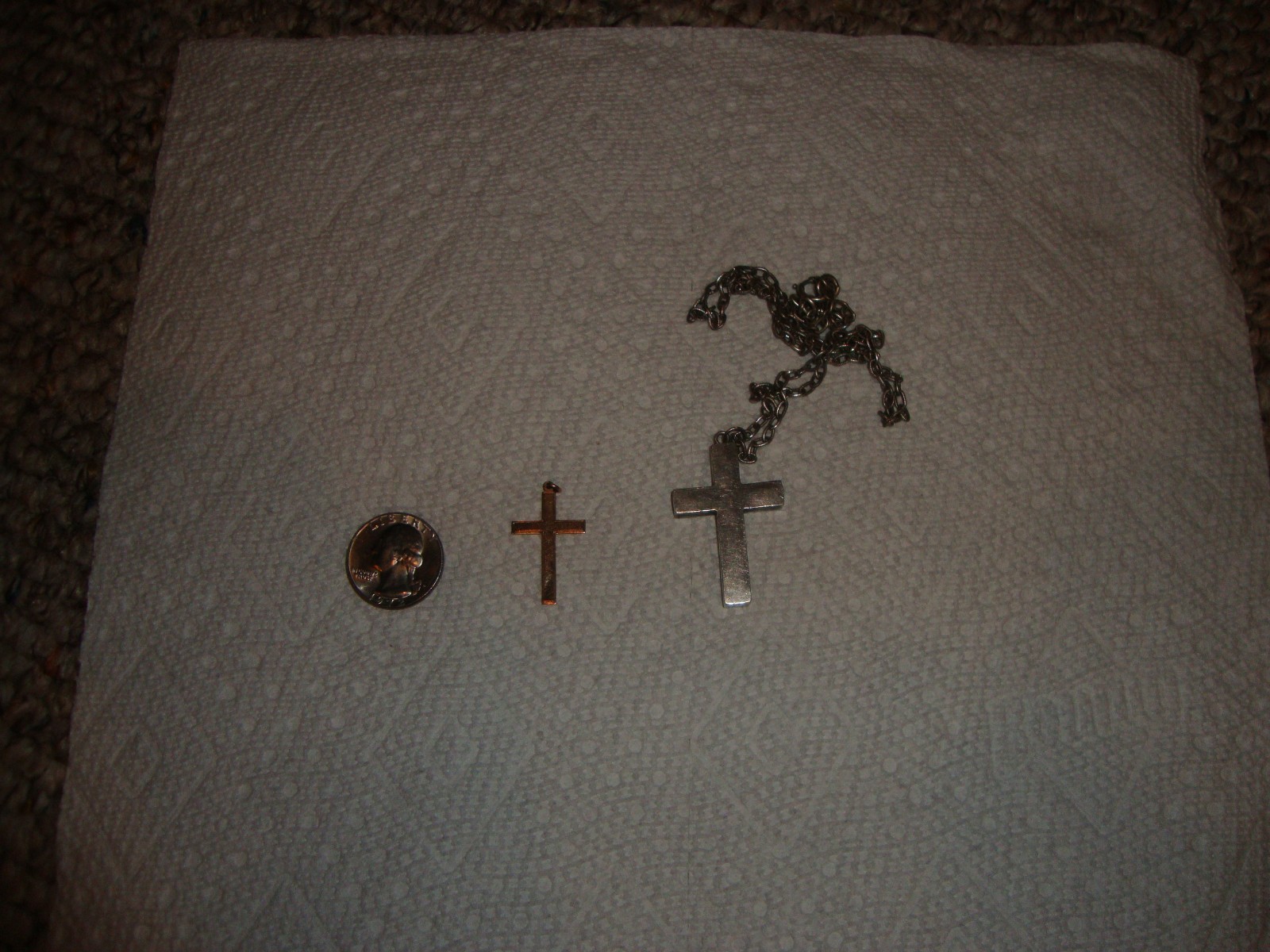 9 kt gold cross and hollow silver cross with silver chain