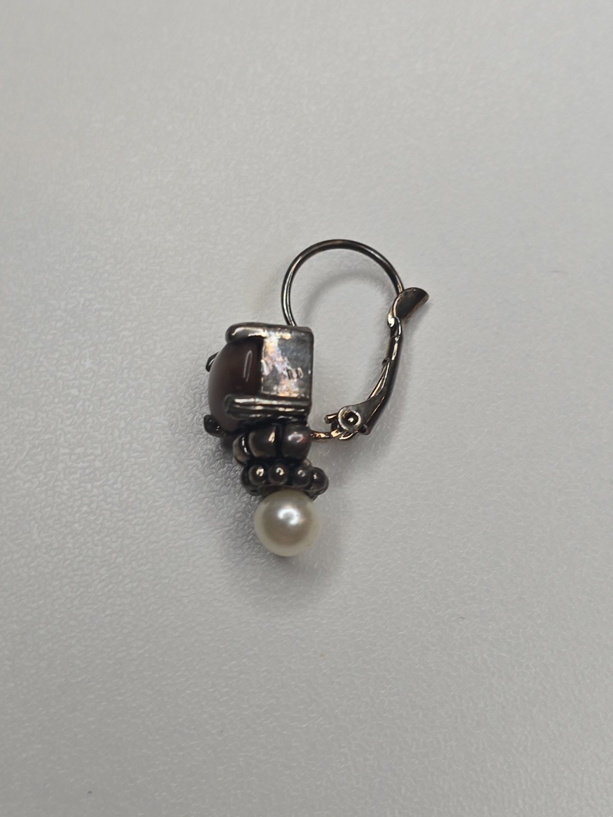 sterling silver Lagos earrings, smoky quartz stone and pearl accent.