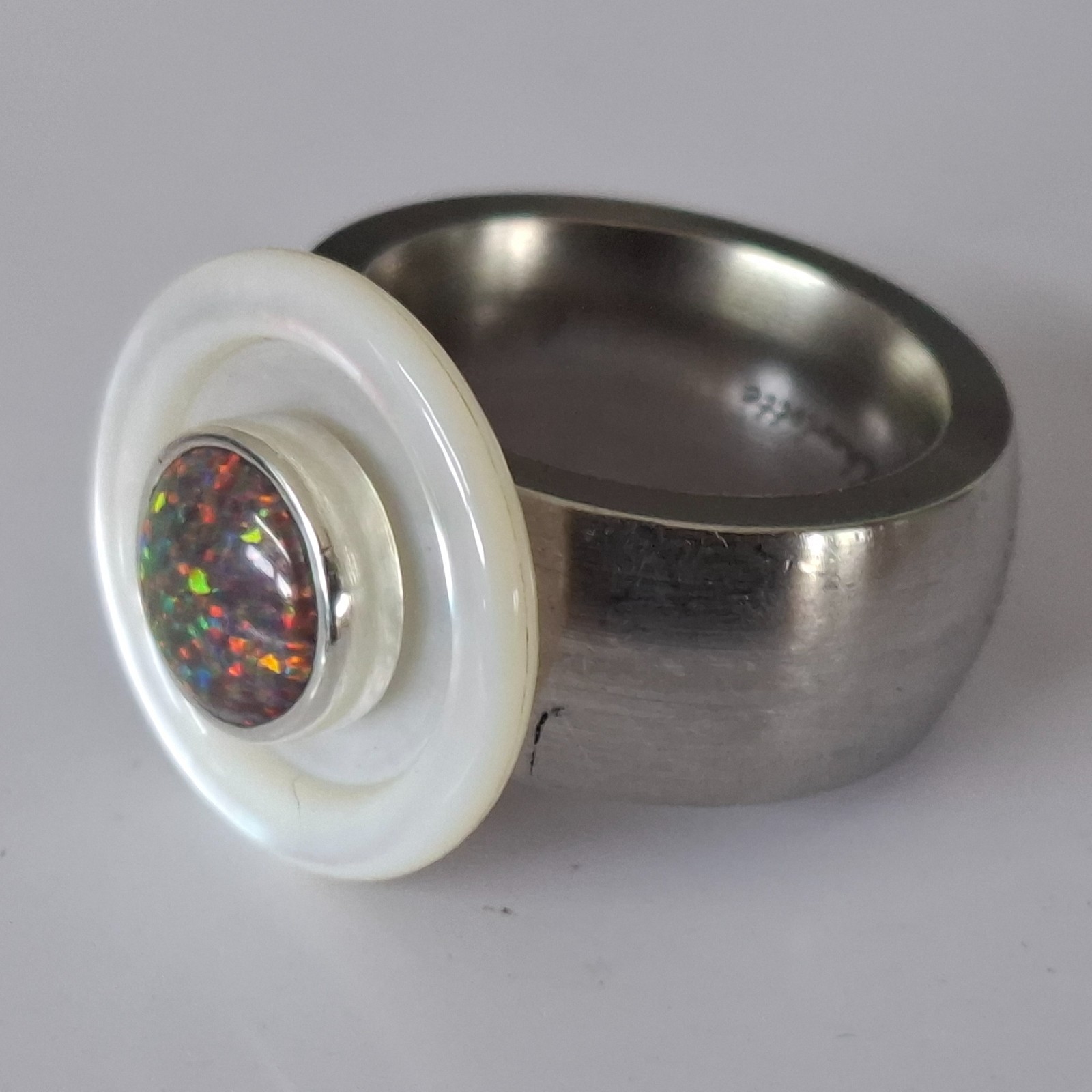 – Beautiful synthetic opal head set in silver for Charlotte 21 –