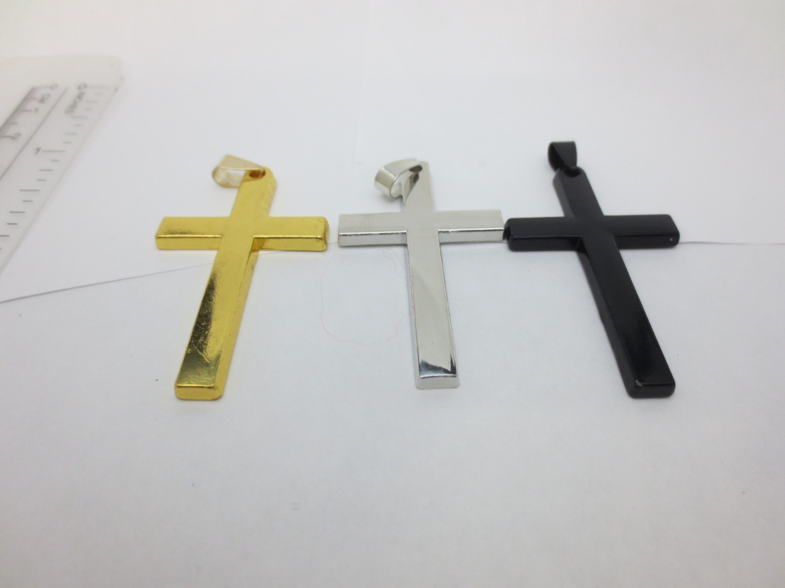 GOLD/SILVER/BLACK STAINLESS STEEL CROSS ALMOST 2 1/4″ HIGH BY 1 1/4″ WIDE P15