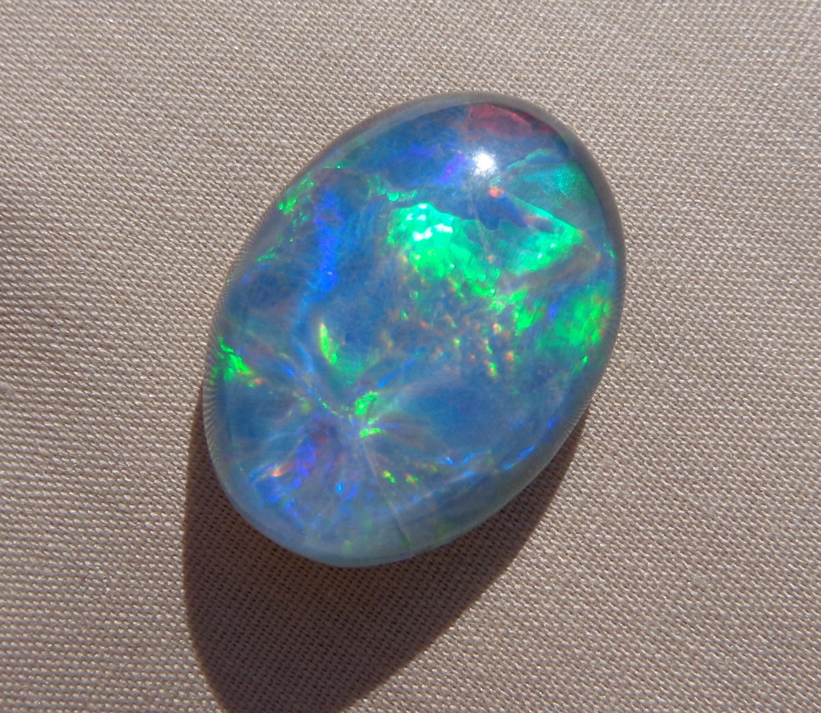 Spencer Idaho Opal Triplet 15X20mm with a Blazing Green Fire in a Galaxy Pattern
