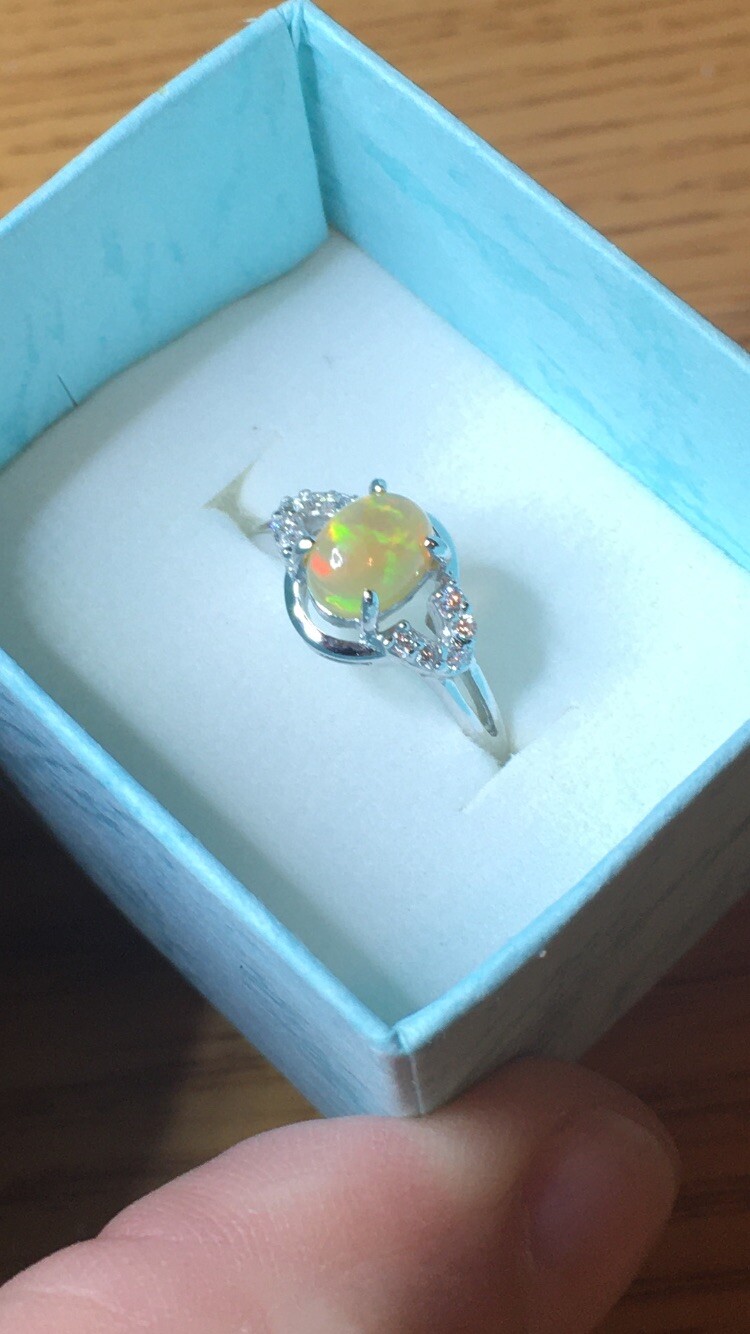 #138B- 0.95ct Genuine Ethiopian Welo Opal set in a Size 8.5 Sterling Silver Ring