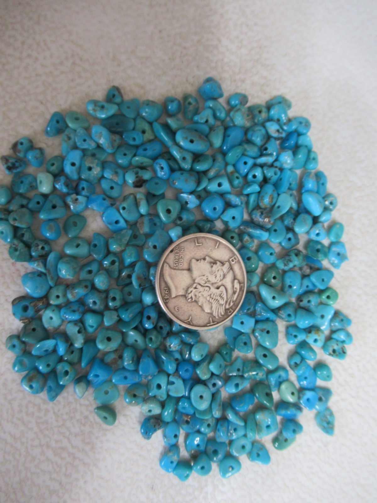 SLEEPING BEAUTY TURQUOISE 1/2 OZ SMALL DRILLED NUGGETS 3X2mm TO 6X4mm #765