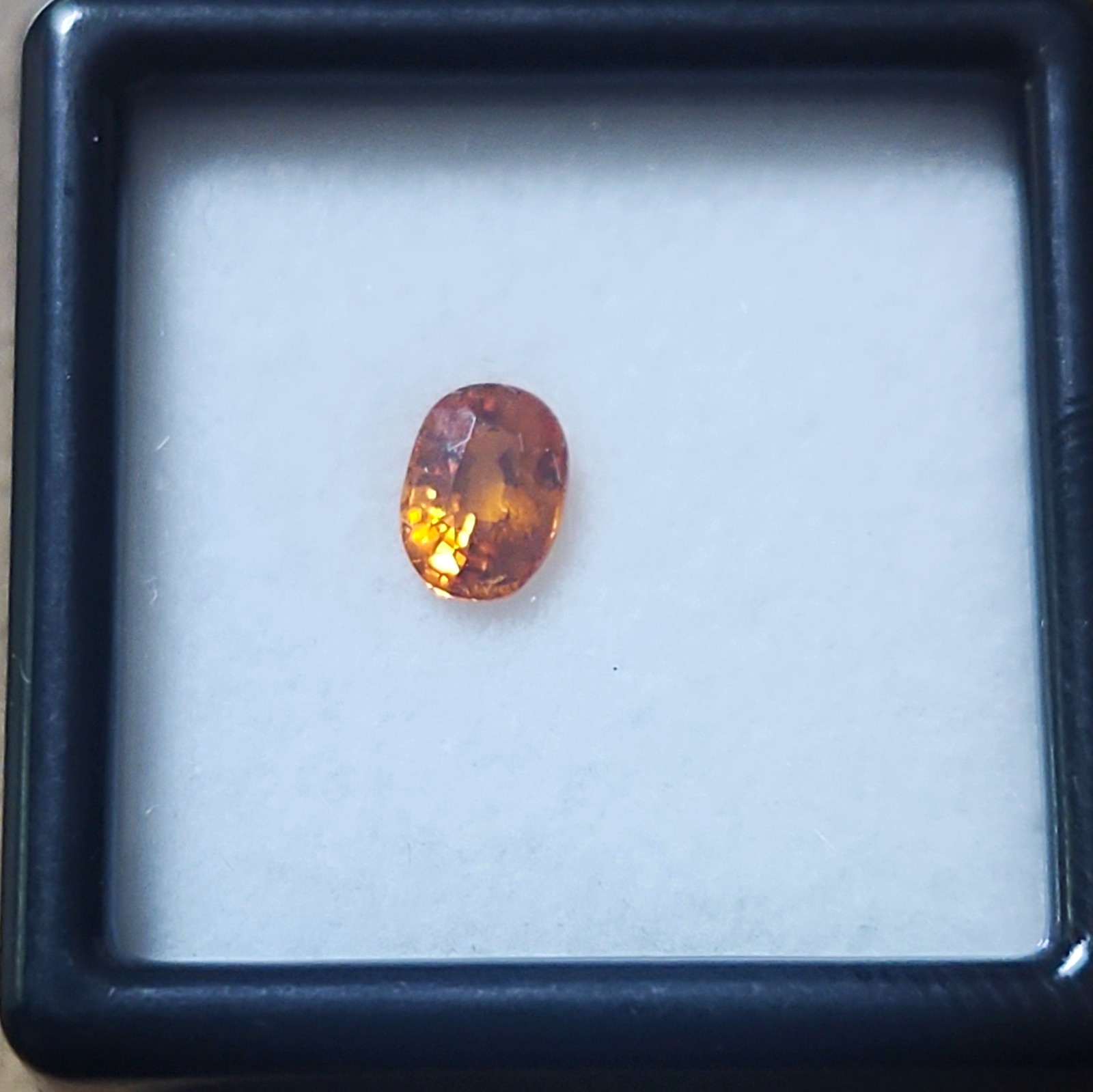 Oval Faceted Cut “Fanta” Orange Spessartite Gemstone, Transparent, .68 Carat