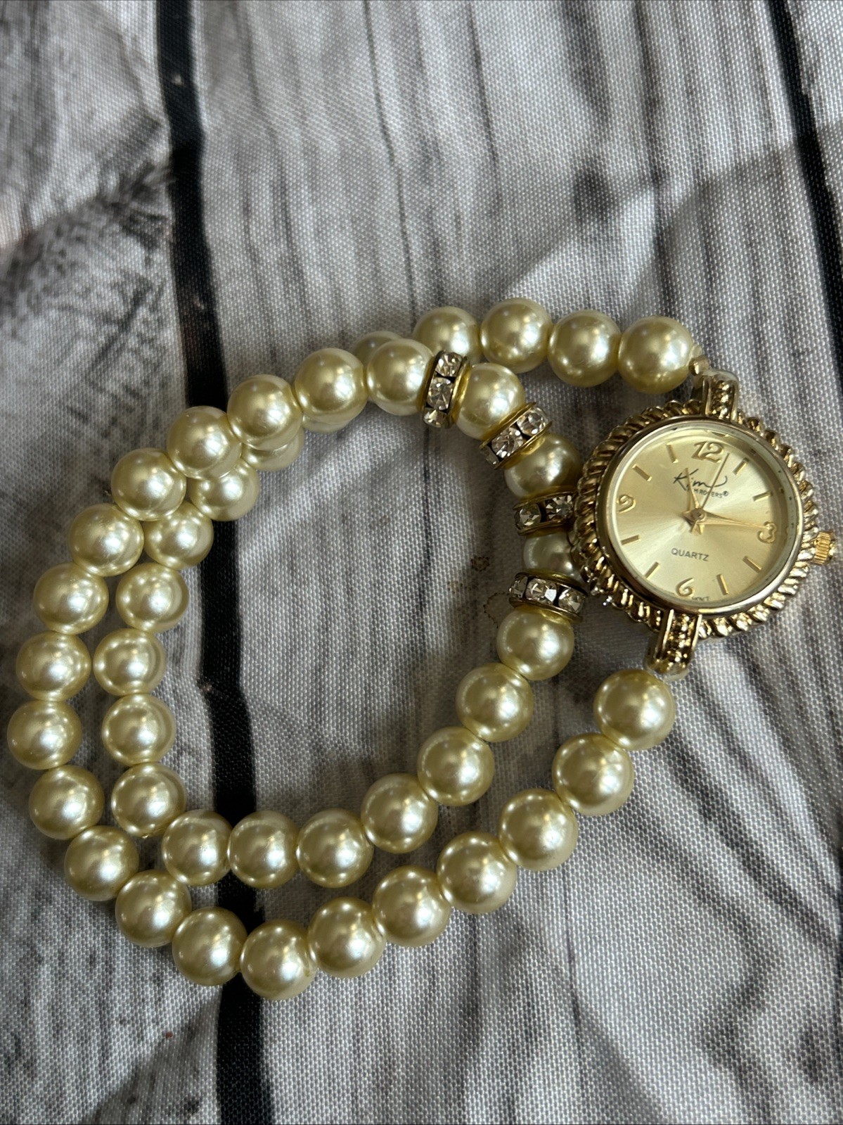 Kim Rogers Gold Tone Pearl Wrap Style Band Watch