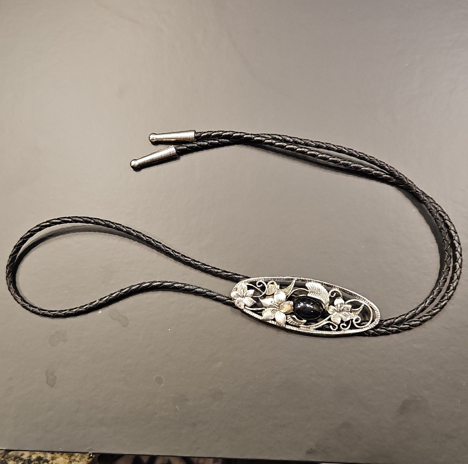 Men’s Western Adjustable Bolo Tie Black Leather Cord Silver Tone Oval Floral