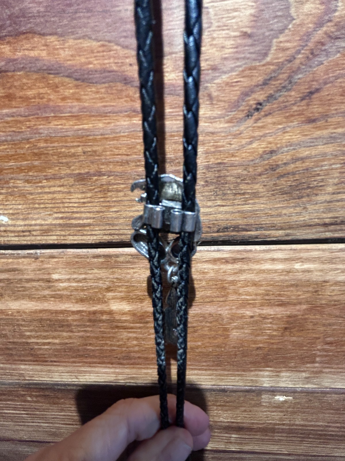 Eagle Head with Feathers Bolo Tie with manmade Turquoise and Ruby