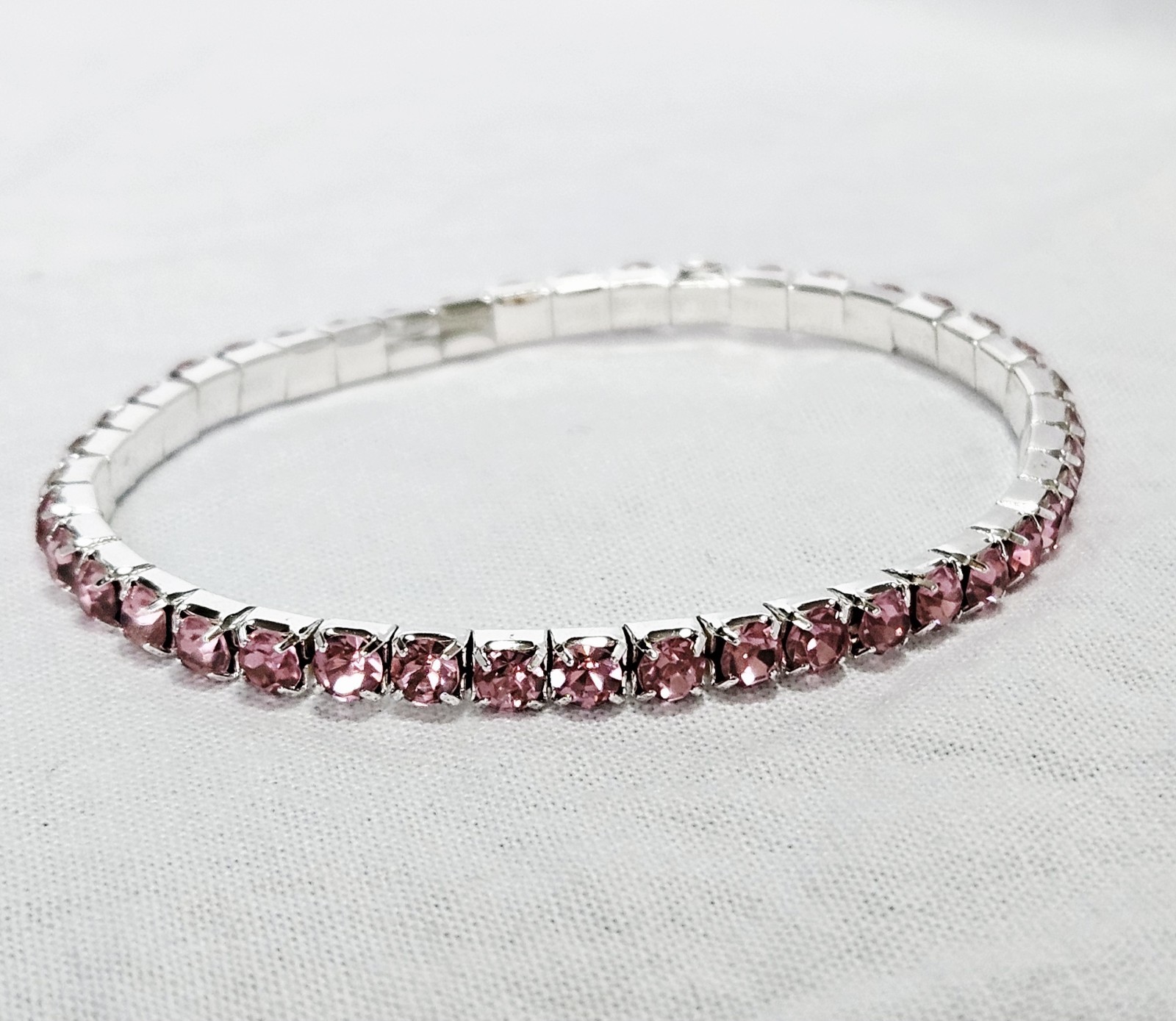 Silver Tone Elastic Tennis Style Bracelet Pink Crystals J15-3638