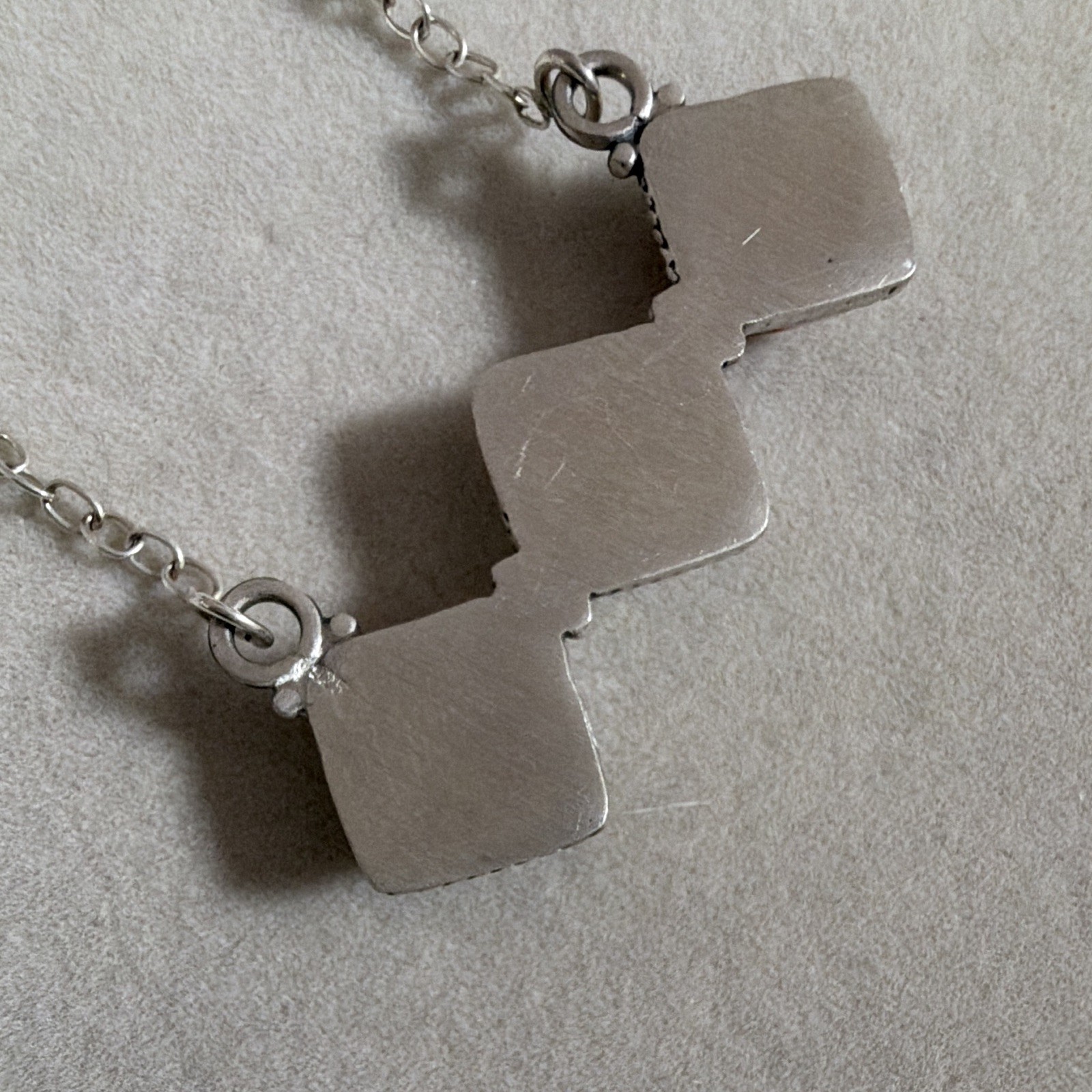 Sterling 925 three stone necklace. pink dahlia, white buffalo, orange spiny. 18”