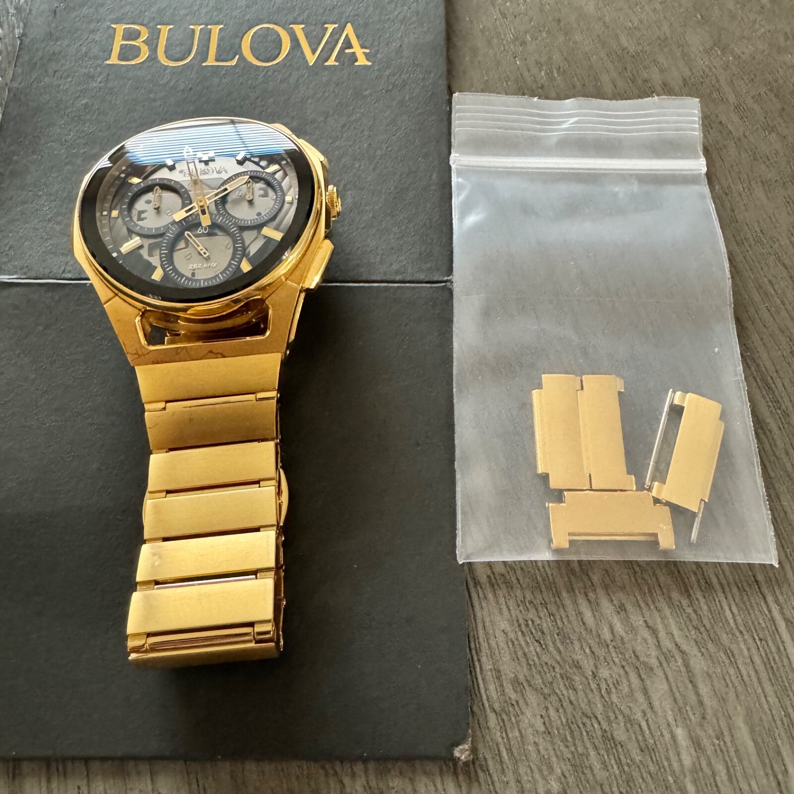 Bulova Curv Black Dial Men’s Watch – 97A144 Gold Tone Stainless