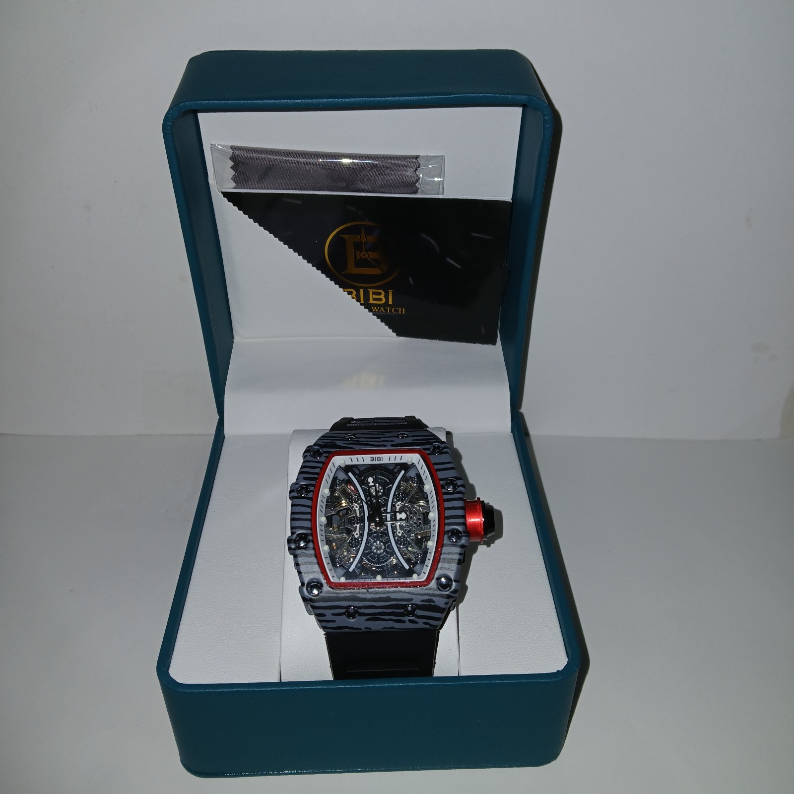 ​BiBi Luxury Skeleton Dial Quartz Watch Men’s Tonneau Case Black Rubber Strap