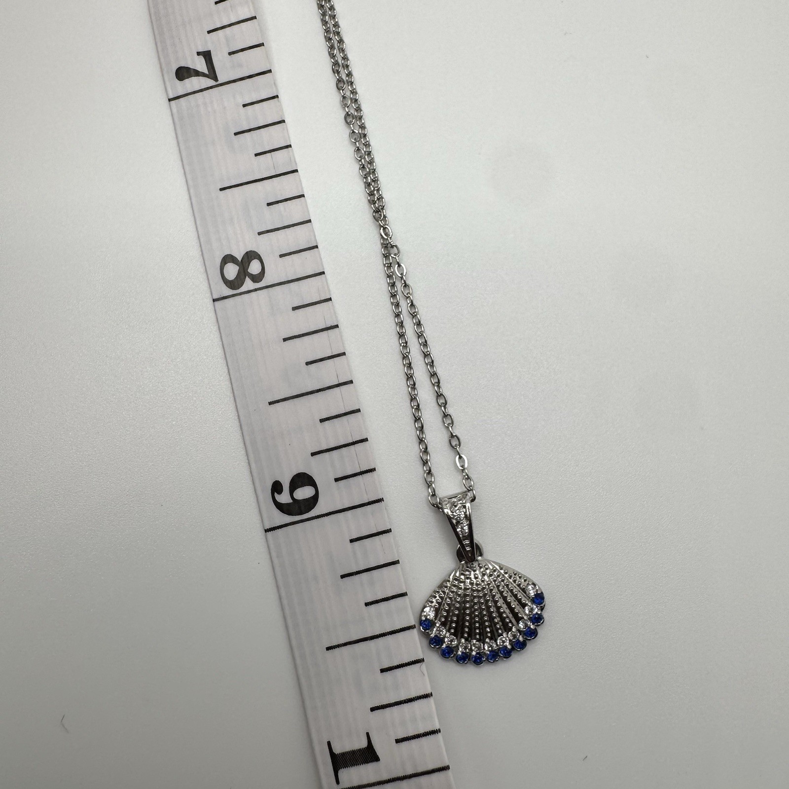 18 K White Gold Plated Steel Shell Necklace With Blue And Clear Cz Stones 18 In