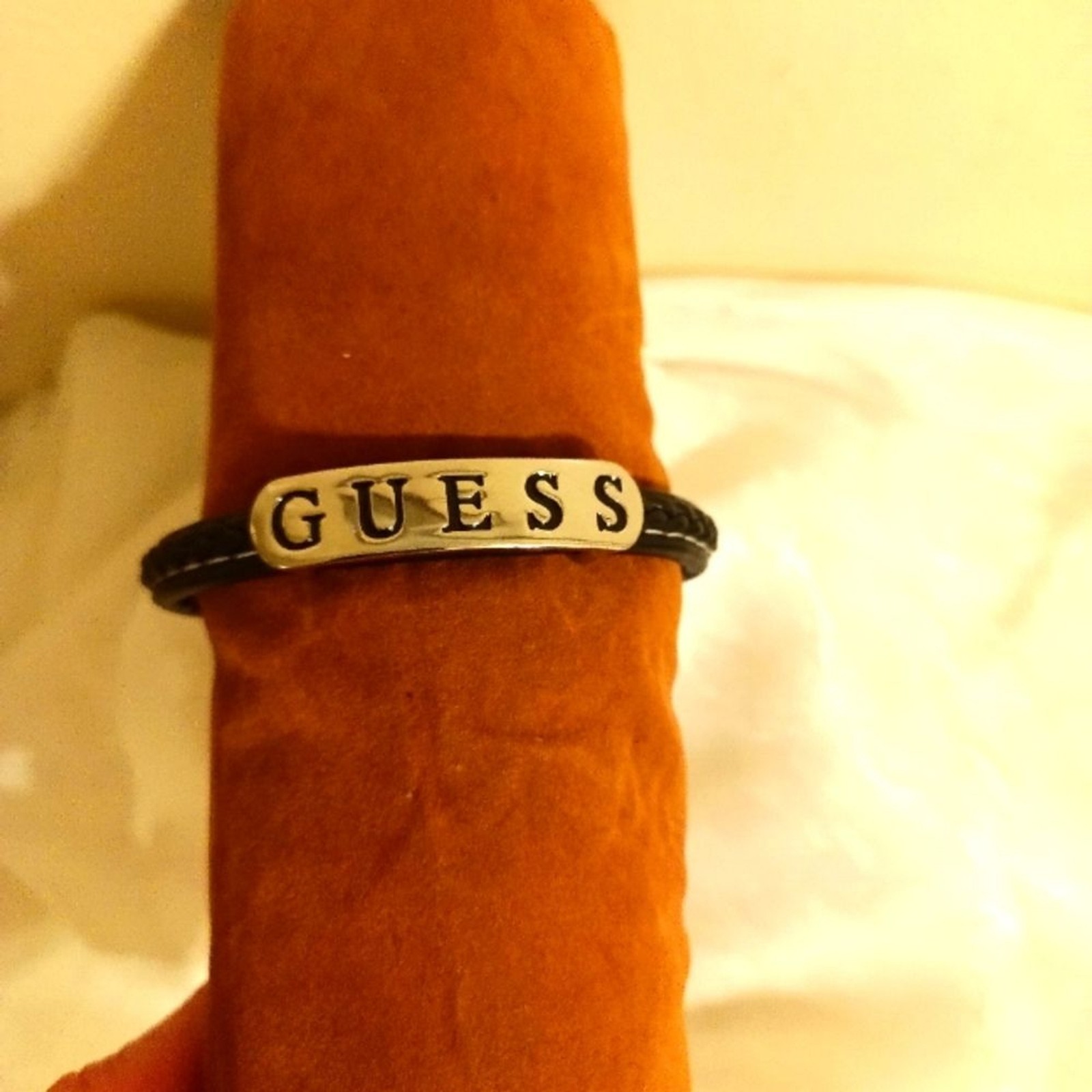 Guess Black leather twine and silver tone women’s bracelet