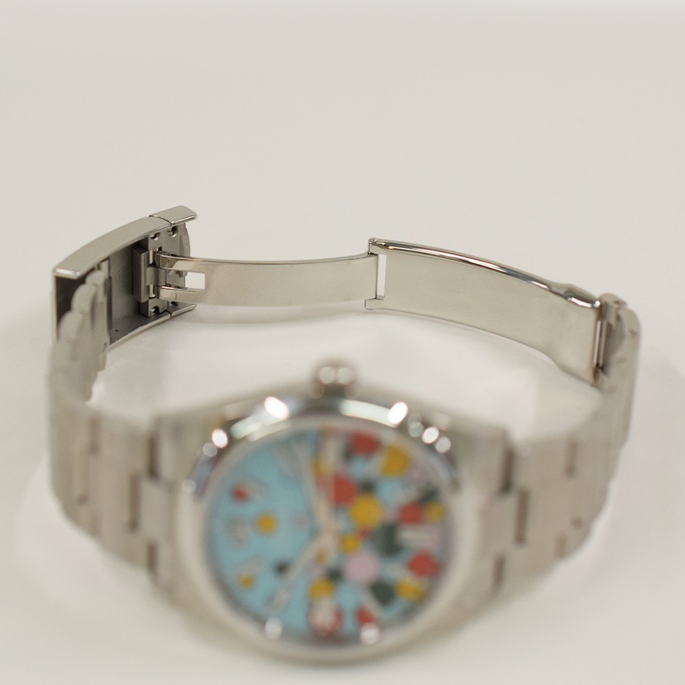 Rolex Oyster Perpetual 41 124300 Celebration Dial Steel Box & Papers Mint