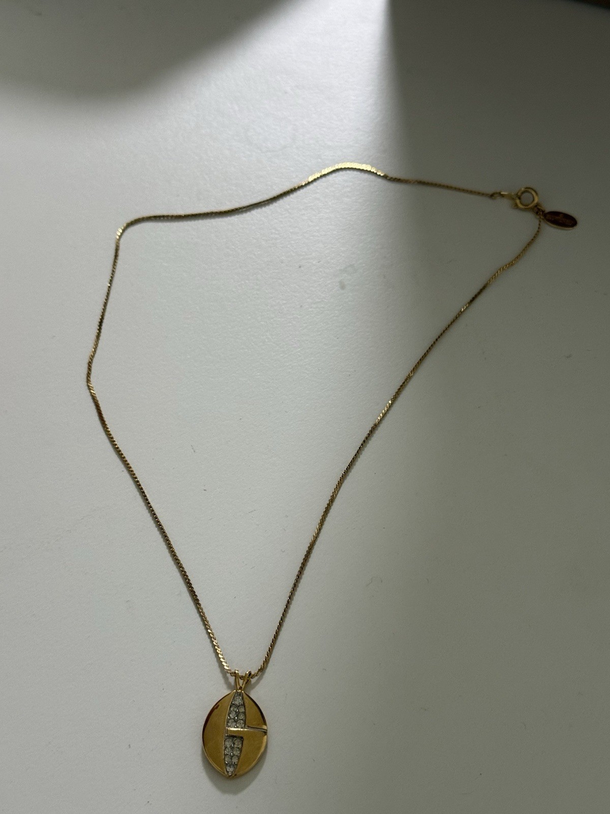 GIVENCHY G Logo Rhinestone Gold Tone Pendant Necklace 15”