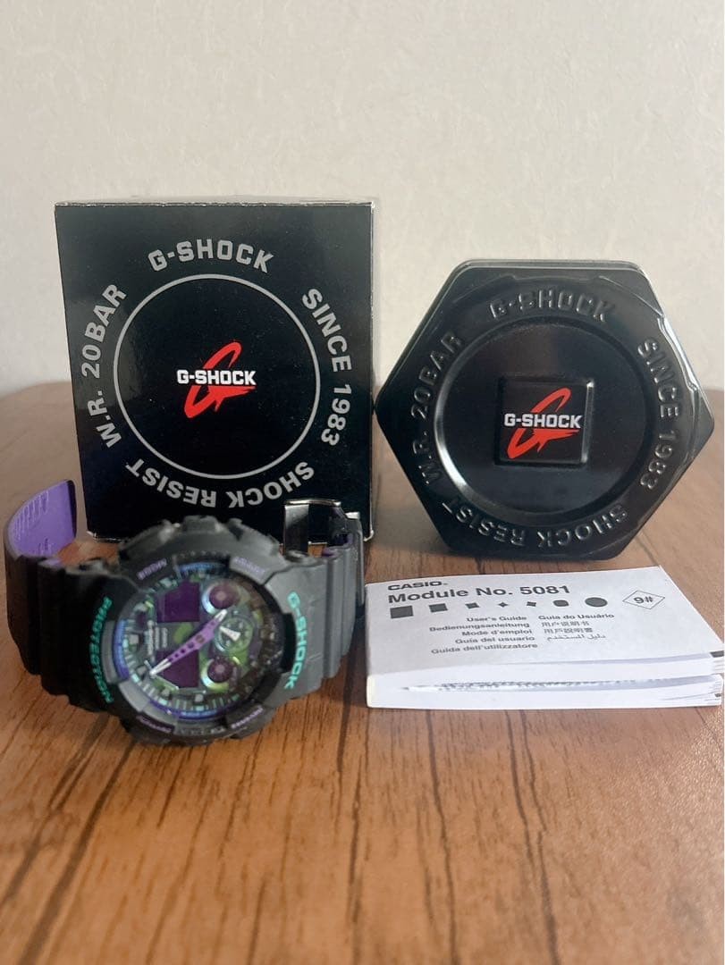 G SHOCK GA 100 1A purple camouflage